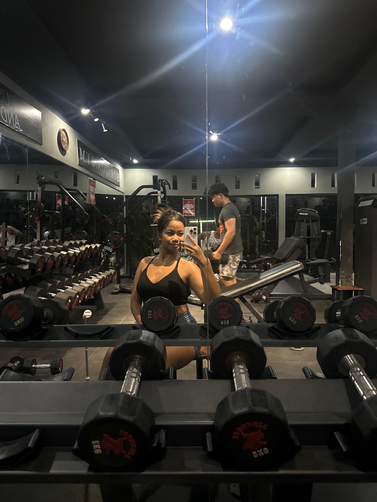 Gym activity documented in Sukawati, Indonesia during afternoon workout session