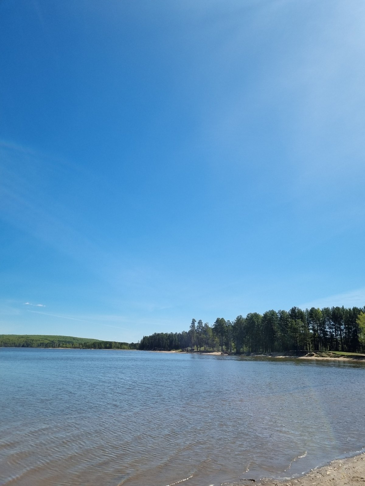 Quiet riverside moment captured in Chaikovsky, Russia