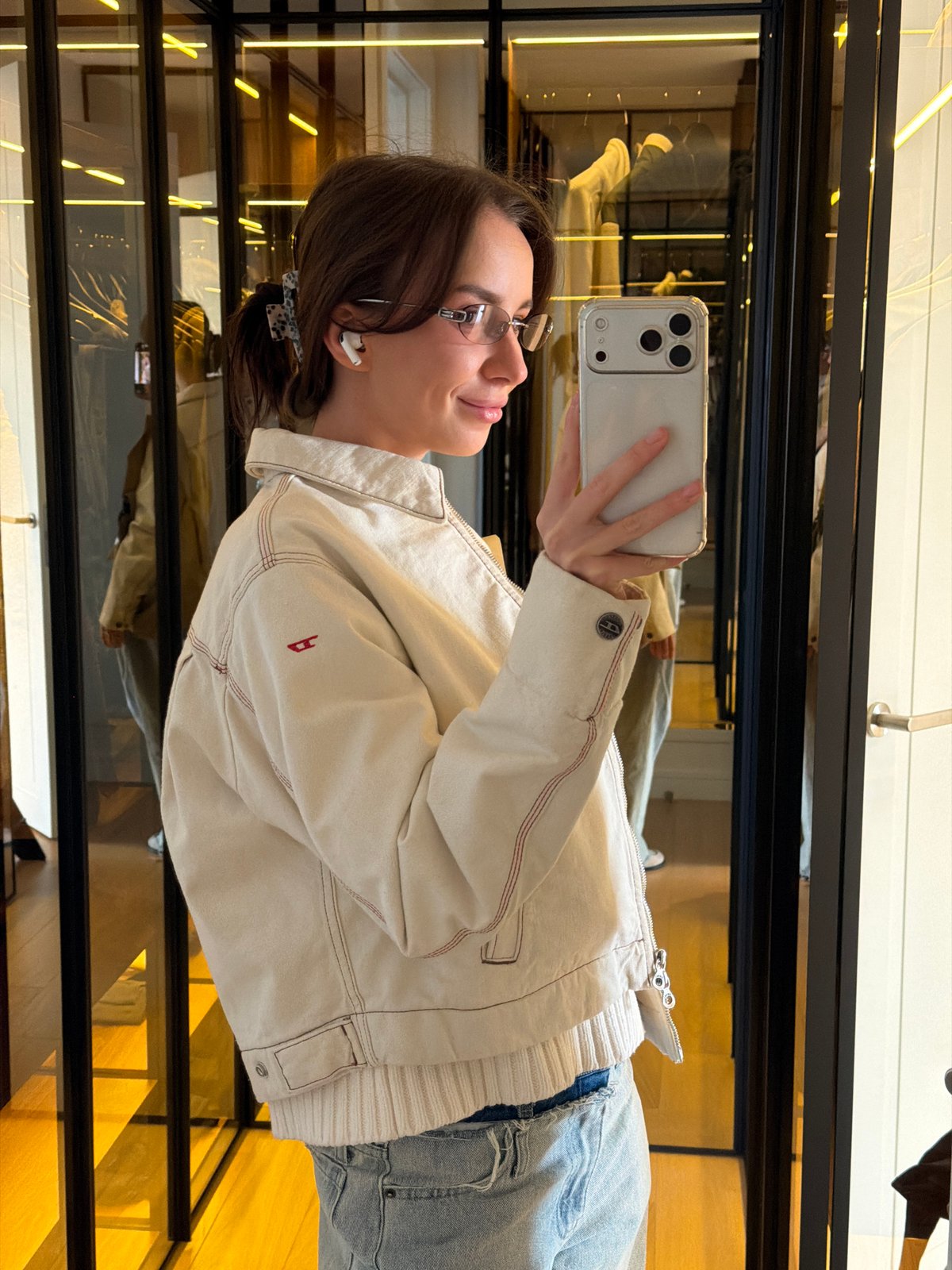 Woman takes selfie in Moscow retail store