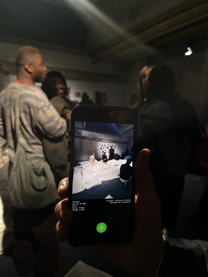 Social gathering documented at industrial Paris venue March evening