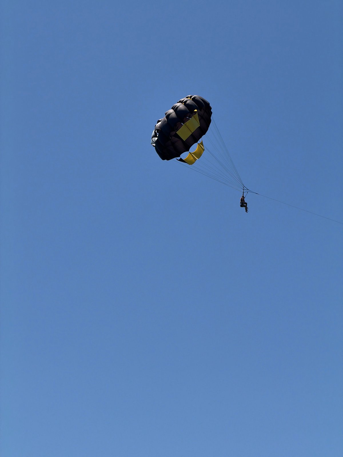 Parasailing and jet skiing off a Russian Black Sea beach
