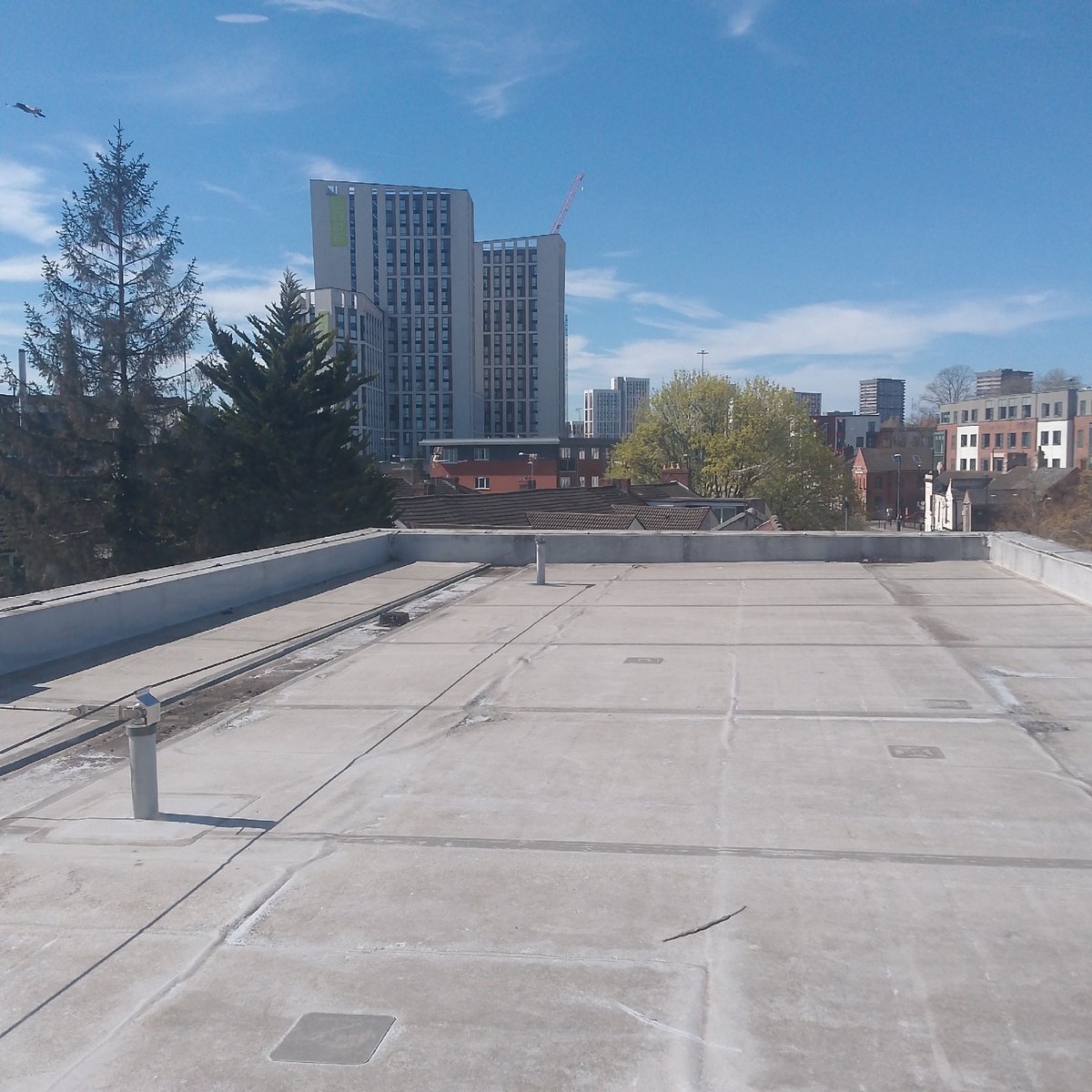 Building survey documented in Coventry shows rooftops, hallways, exteriors
