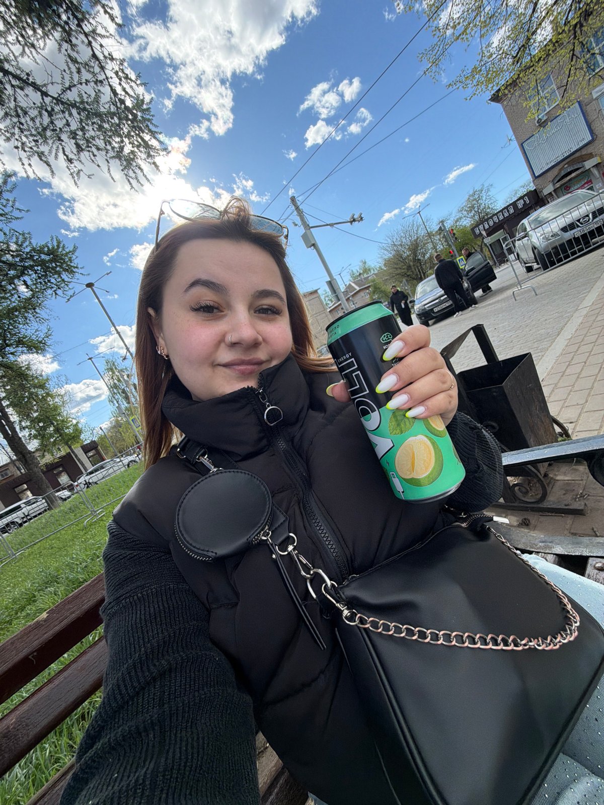 Woman enjoys riverside visit in Chaikovsky, Russia
