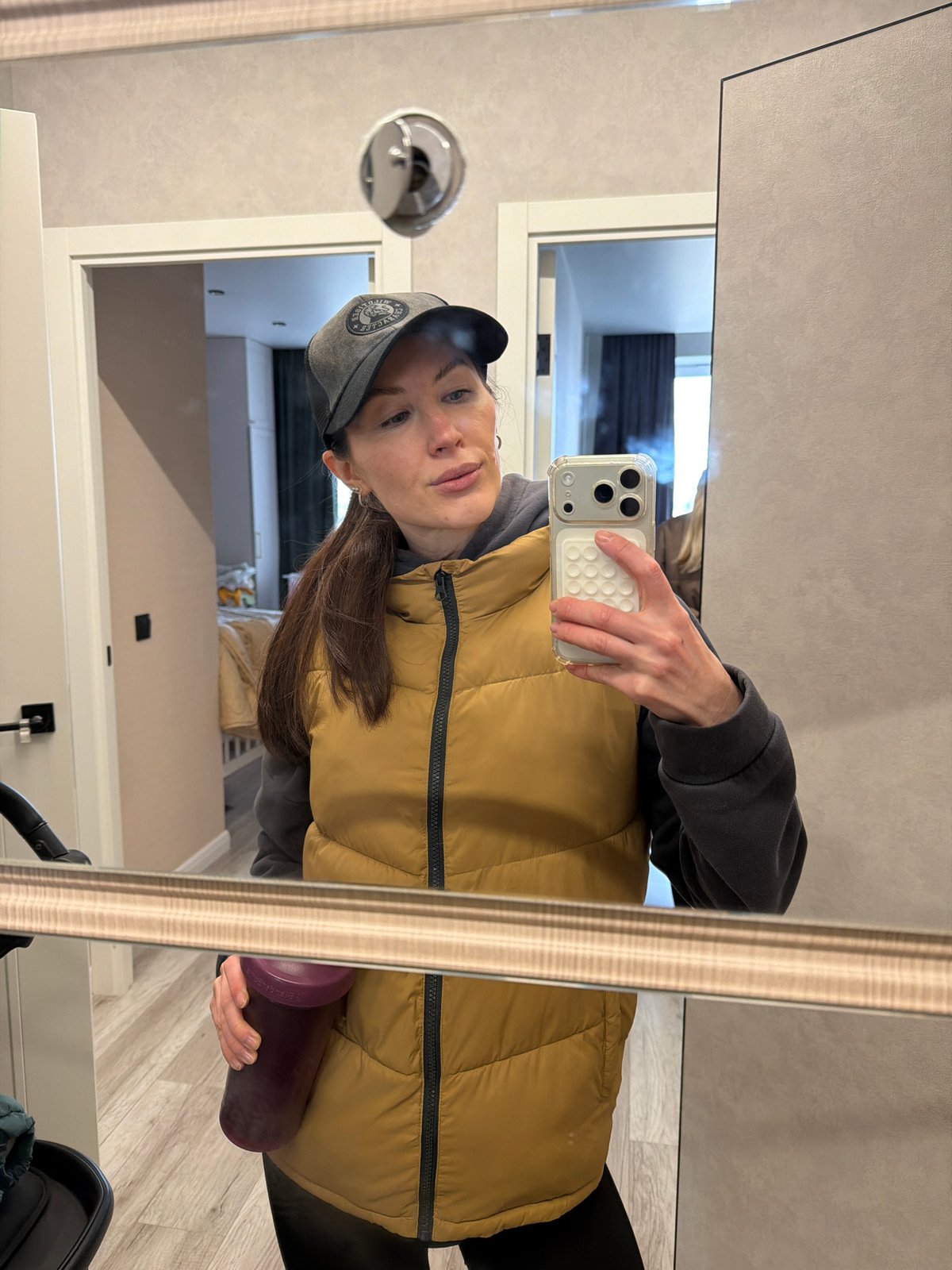 Woman takes mirror selfie in Perm, Russia