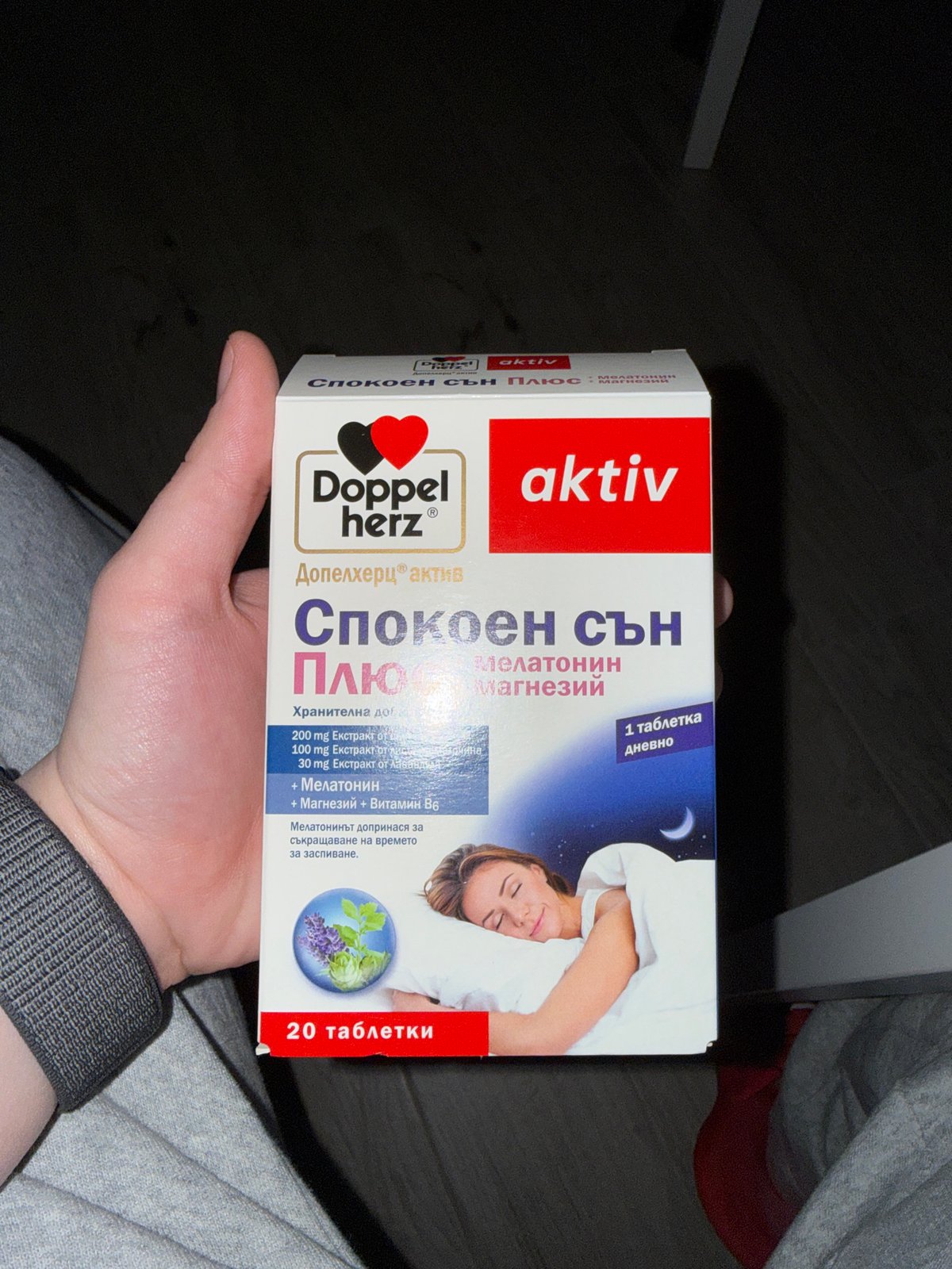 Person holds sleep supplement box in Sofia, Bulgaria