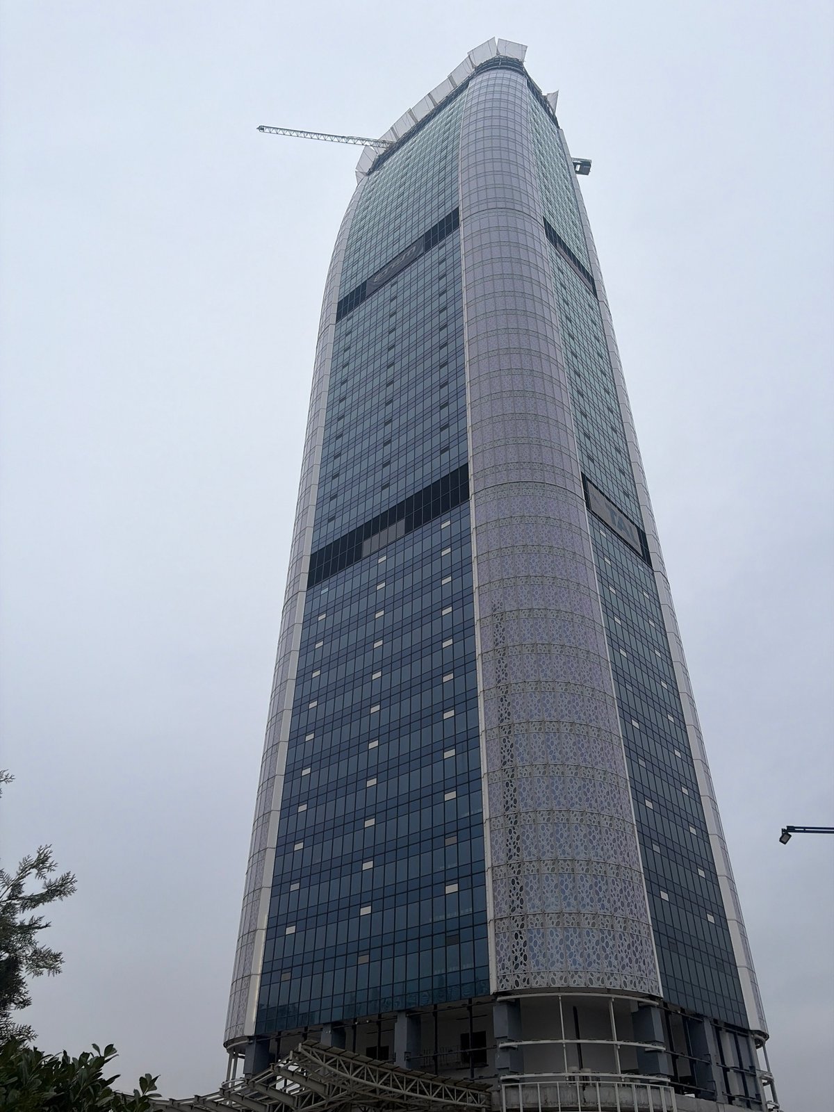 Incomplete Capital Fort skyscraper photographed from below in Sofia