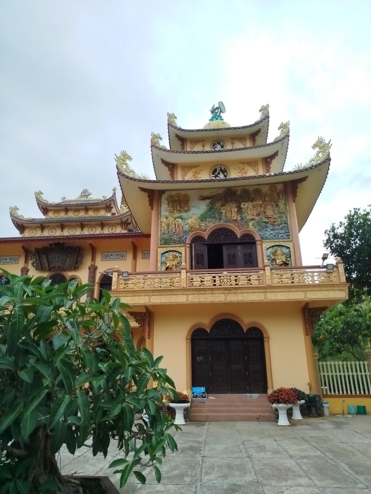 Visitors document morning temple experience at Buu Son Tu, Vietnam