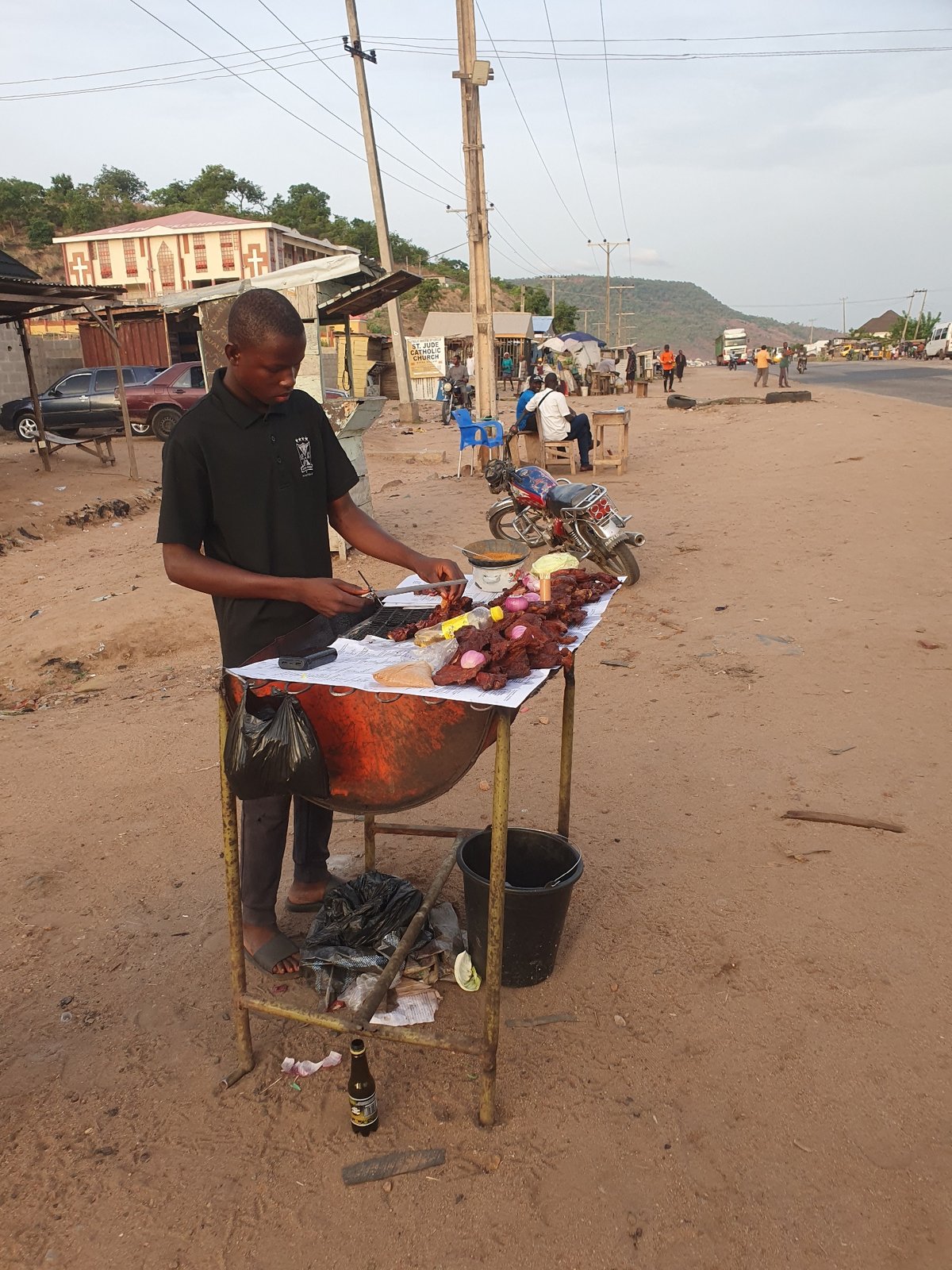 Daily street life documented across Lokoja Nigeria April afternoon