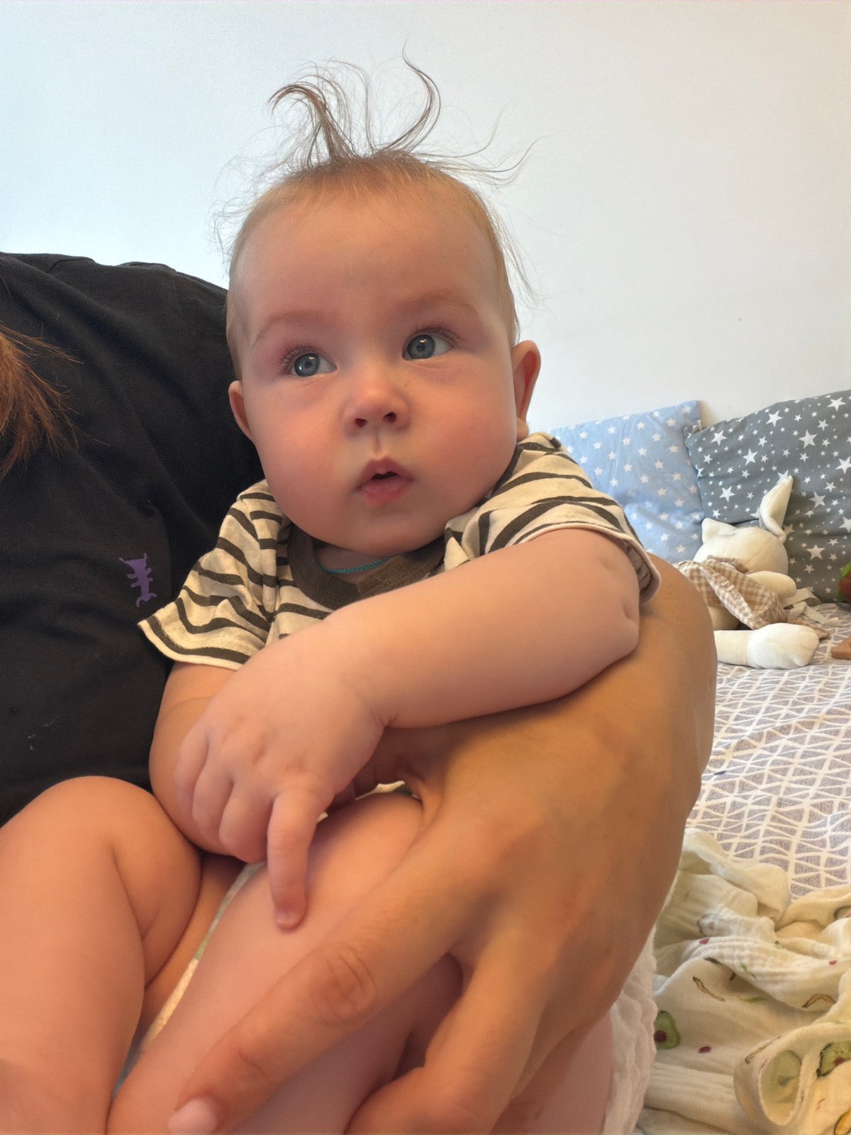 Home moments with a baby in Chaikovsky, early one morning
