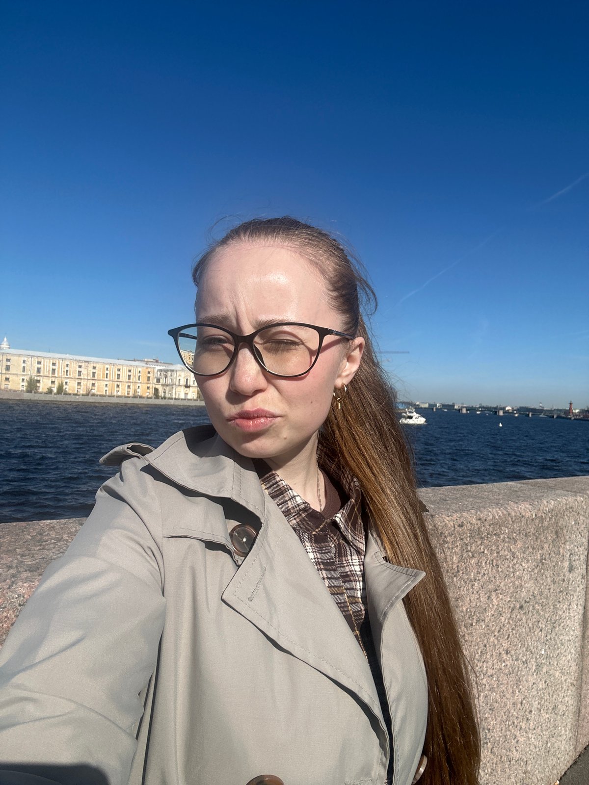 Tourist documents sunny afternoon sightseeing tour through historic Saint Petersburg