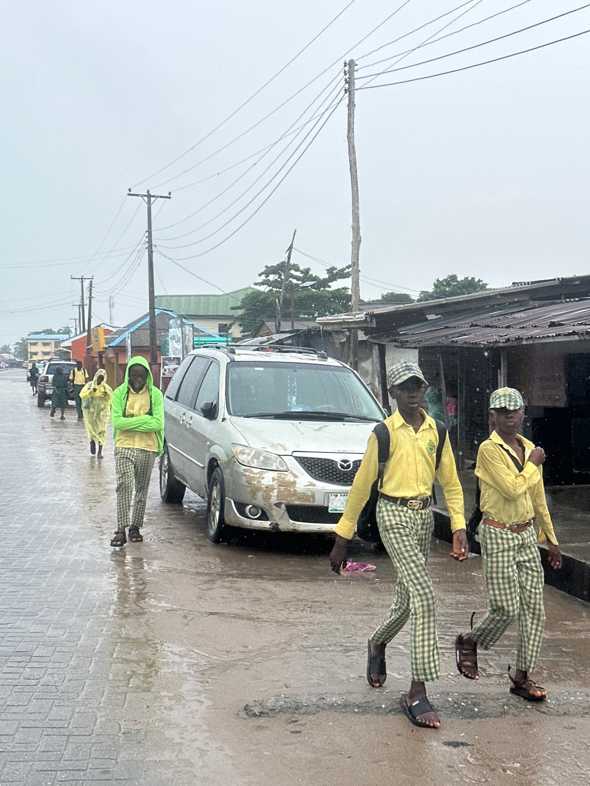 Rainy afternoon street activity in Badagry, Nigeria