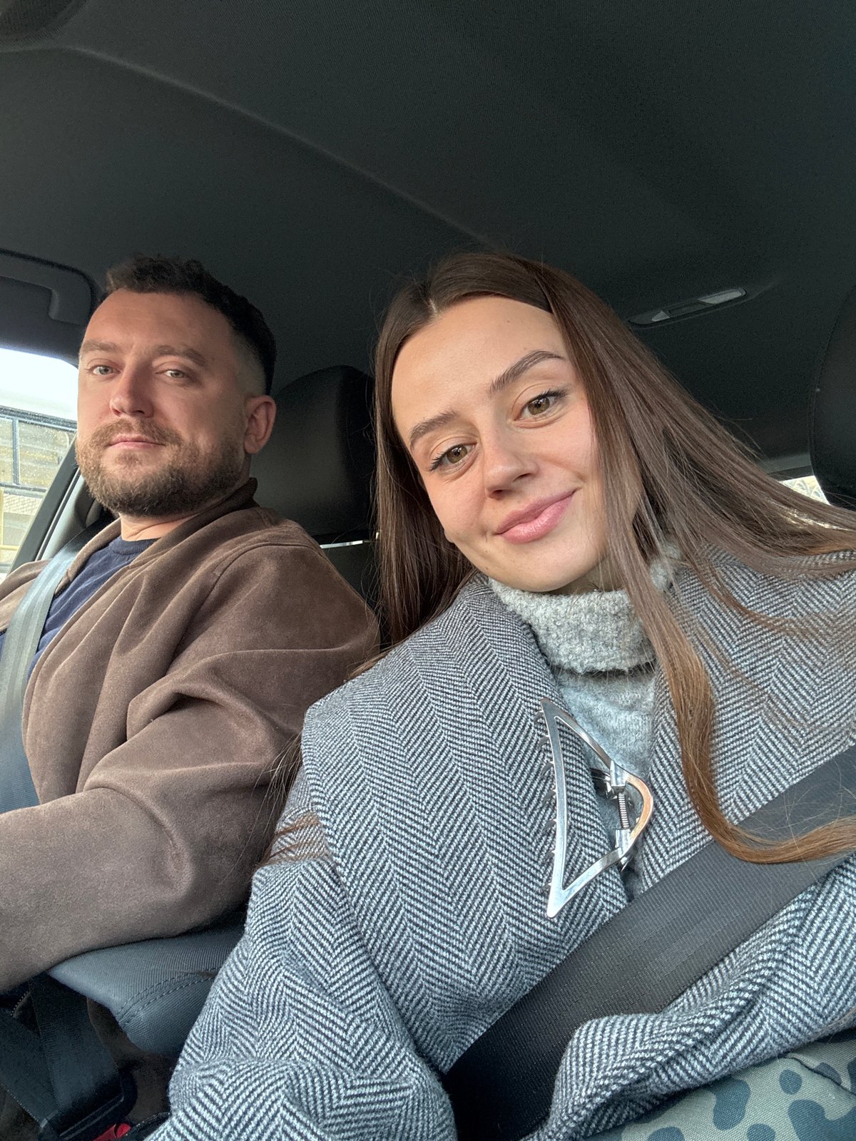 Two people photographed in vehicle in Krasnoyarsk, Russia