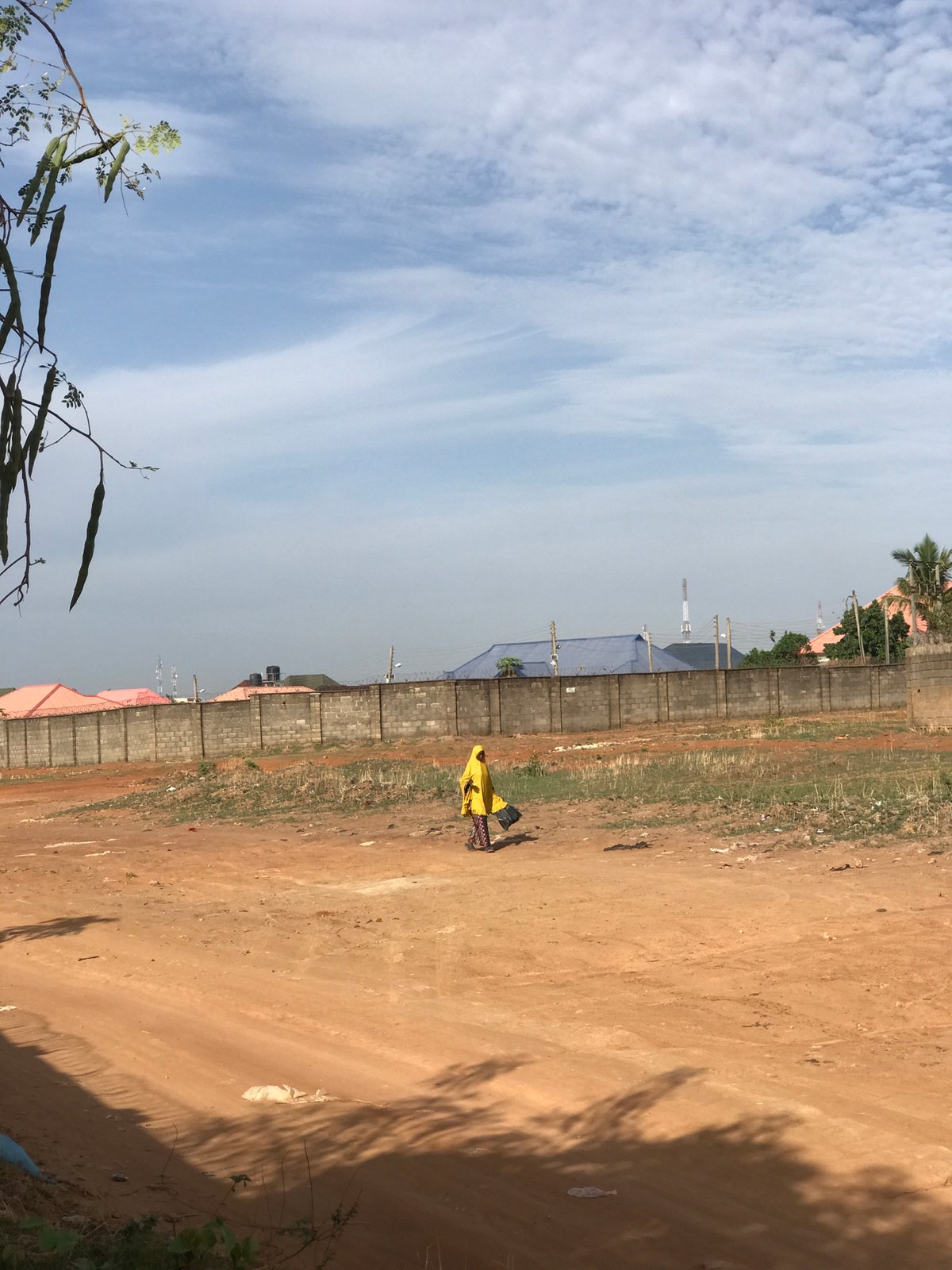 Morning street life documented across Abuja neighborhoods