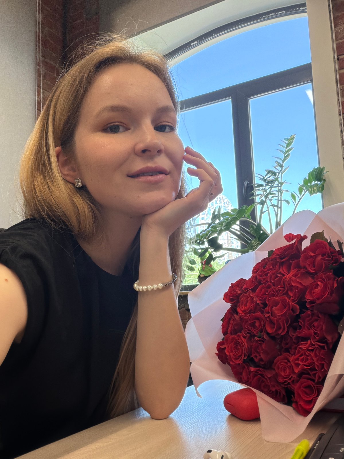 Woman documents receiving red roses in Izhevsk, Russia