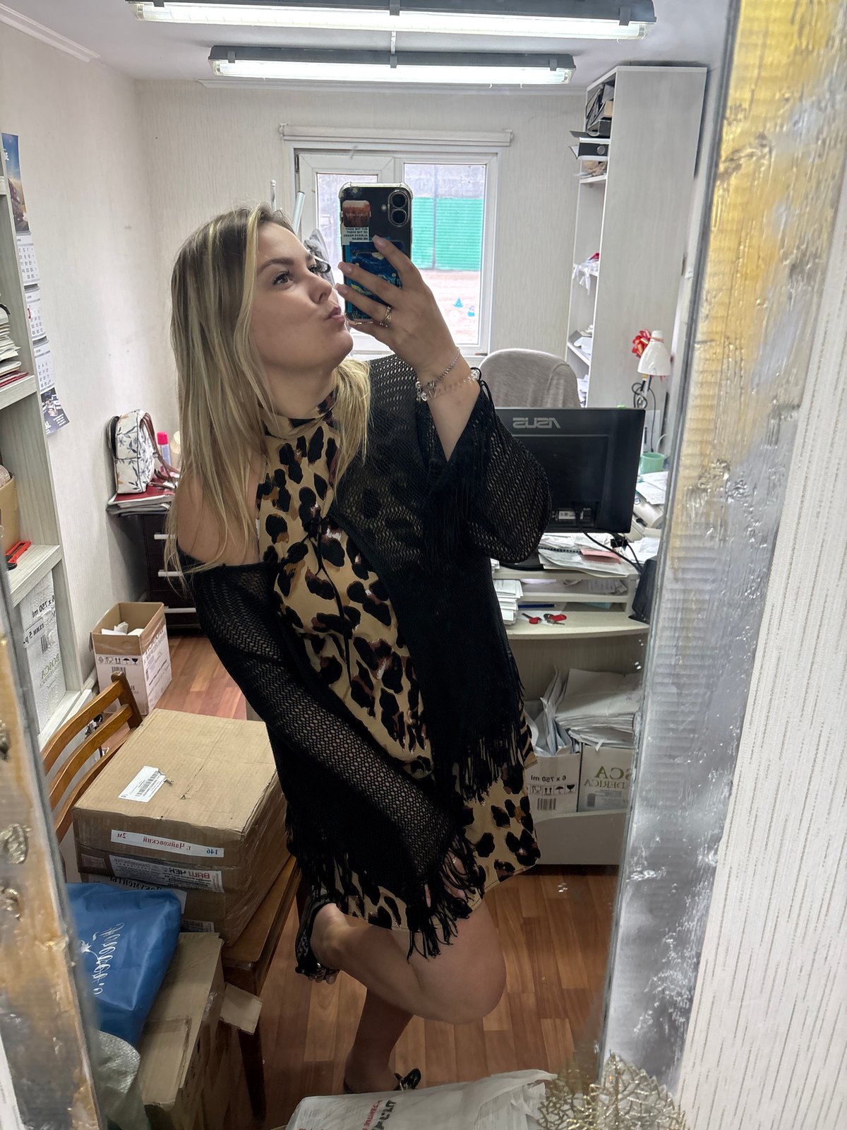 Selfie session in a Noviy, Russia office, leopard print and attitude