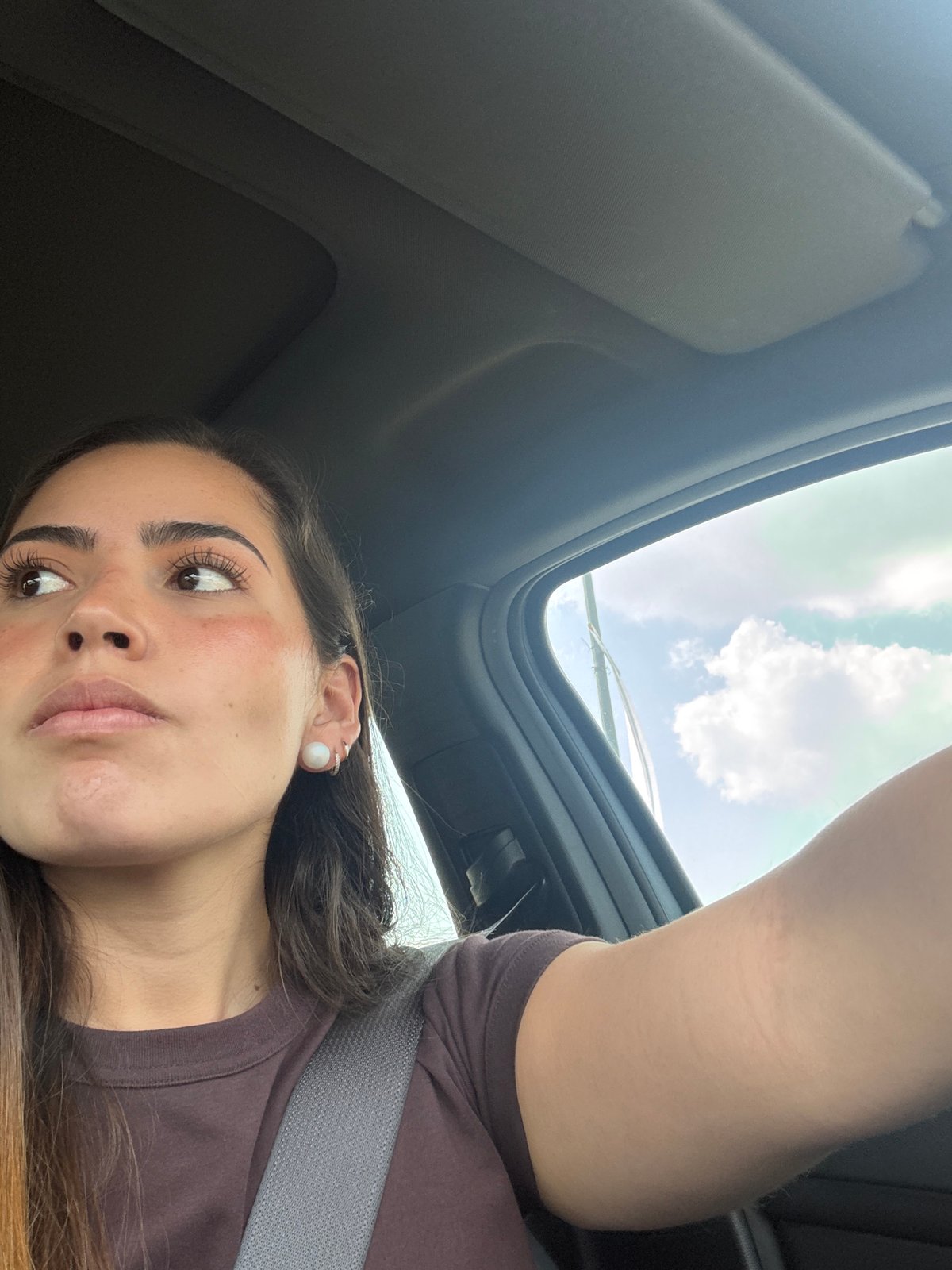 Woman and Uber Eats driver share road moment in Puebla