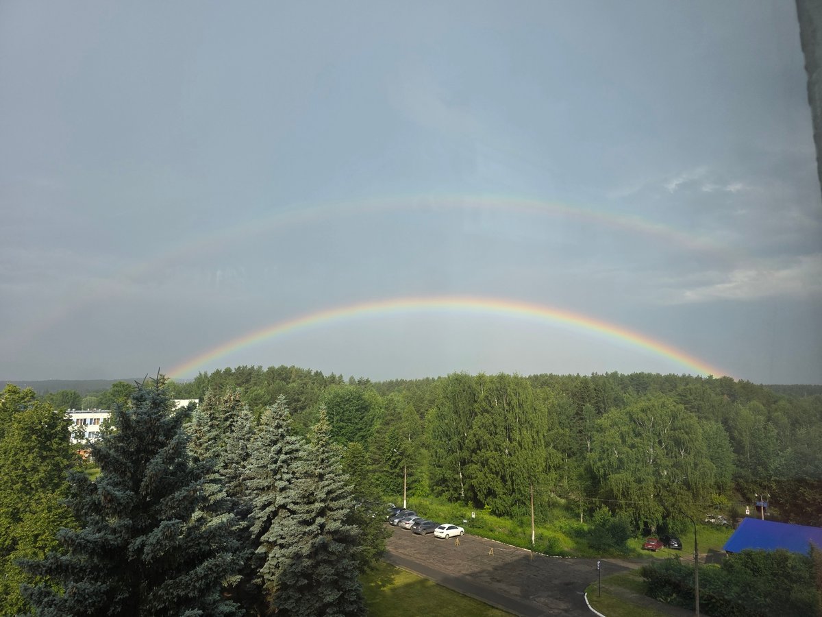 Double rainbows over Chaikovsky, paired with casual evening snapshots.