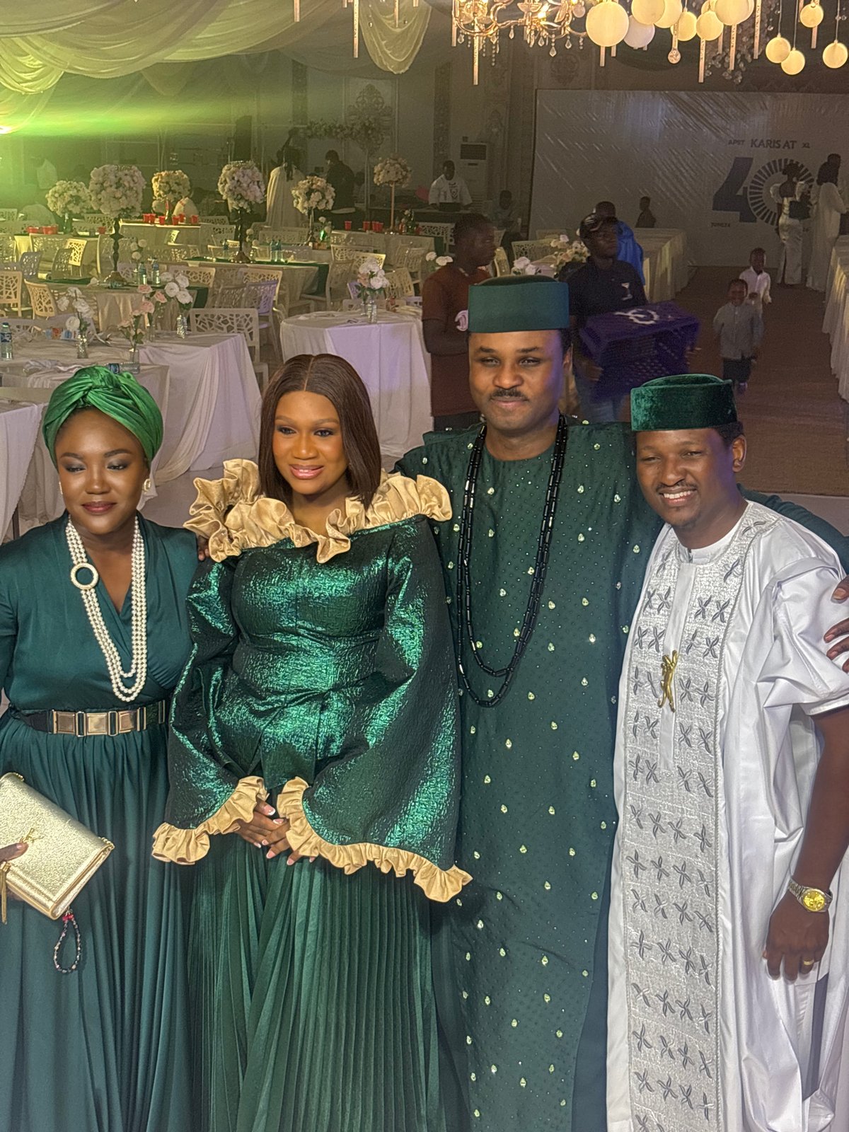 Formal celebration in Jos, Nigeria with traditional dress and décor