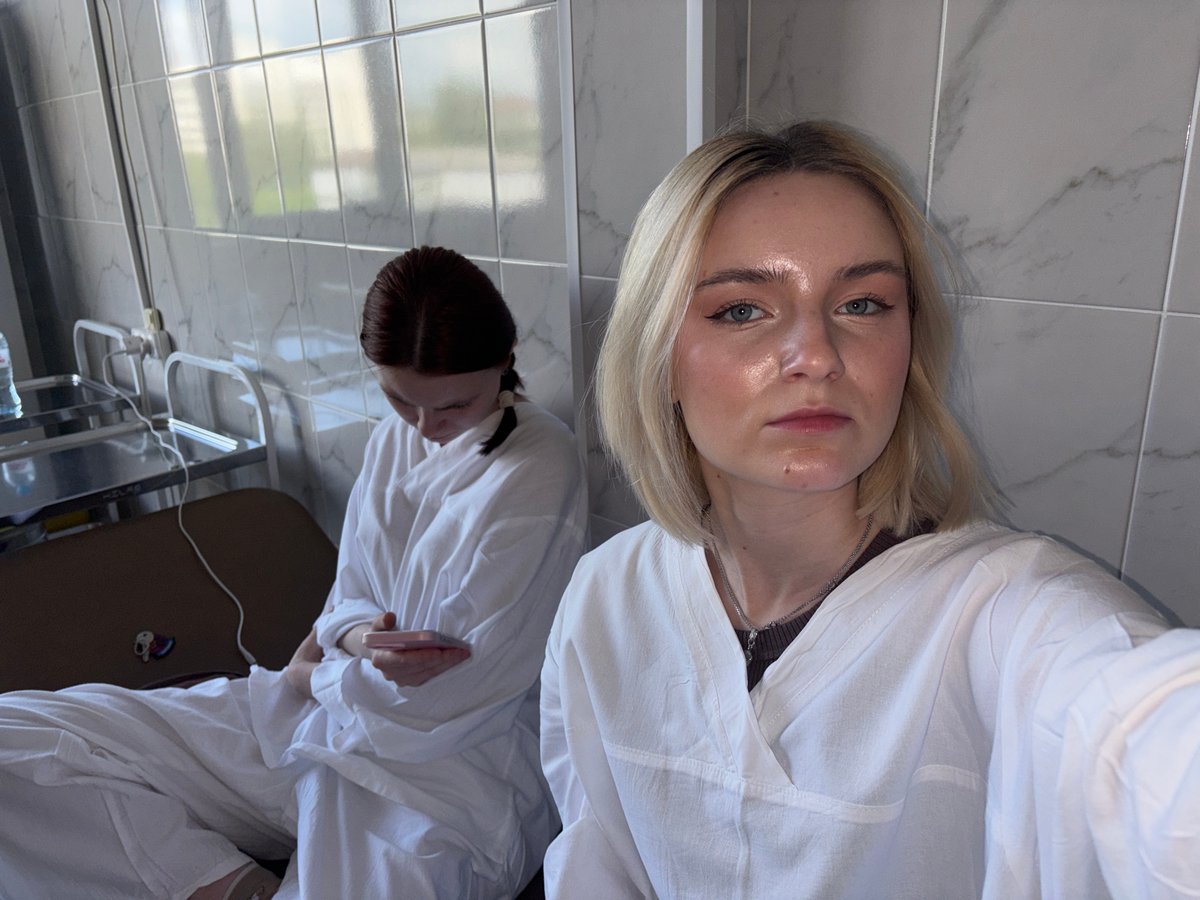 Woman takes selfies in medical facility in Saint Petersburg
