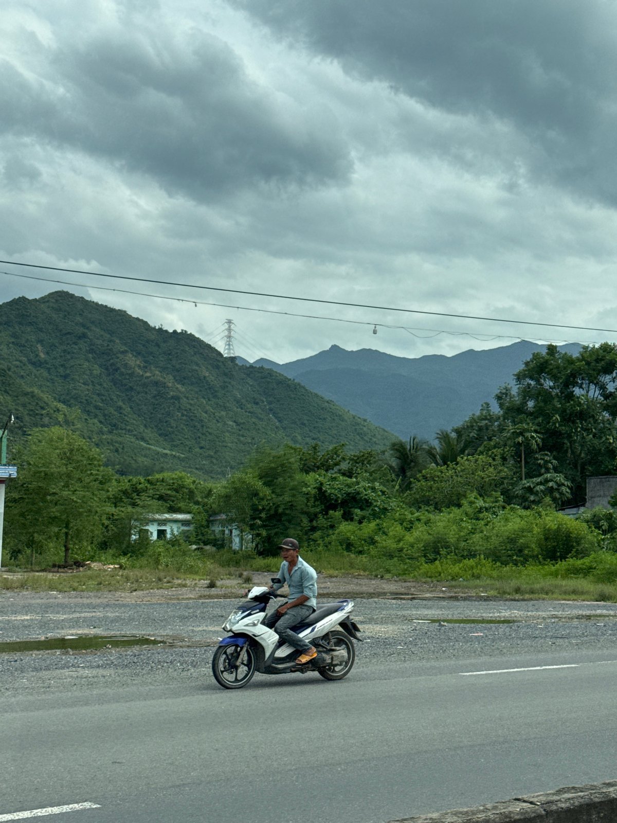 Scooter on a mountain road in Nam Ninh Hòa, Vietnam