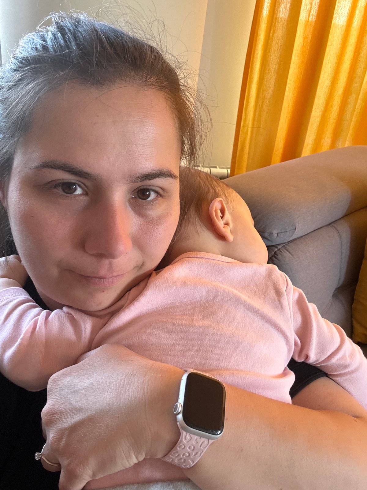 Intimate mother-baby portrait captured indoors in Sofia, Bulgaria