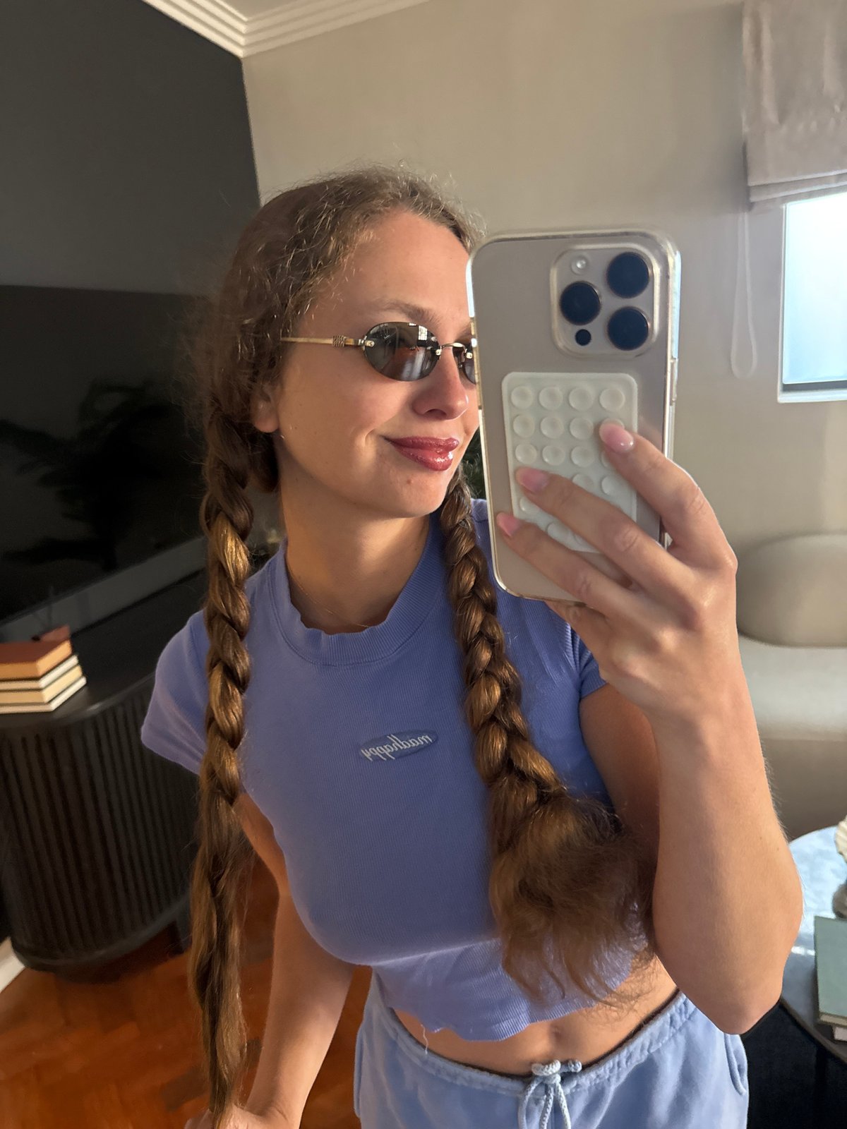 Woman takes selfie indoors in Cape Town