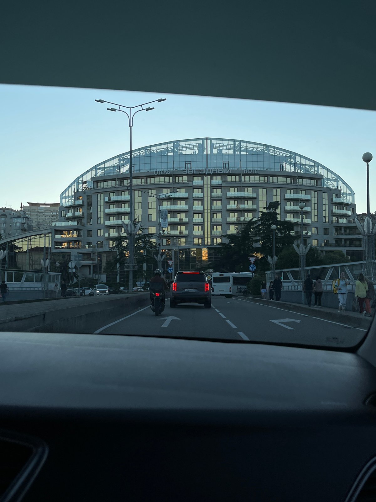 Sochi resident documents street scene and floral artwork