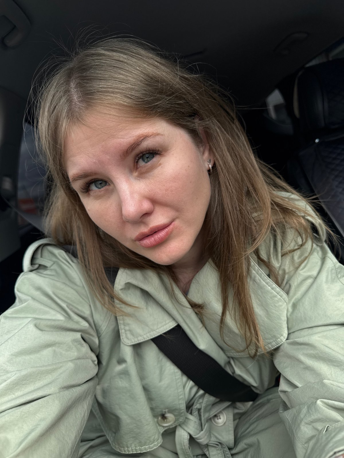 Woman takes selfies in car, Perm Russia