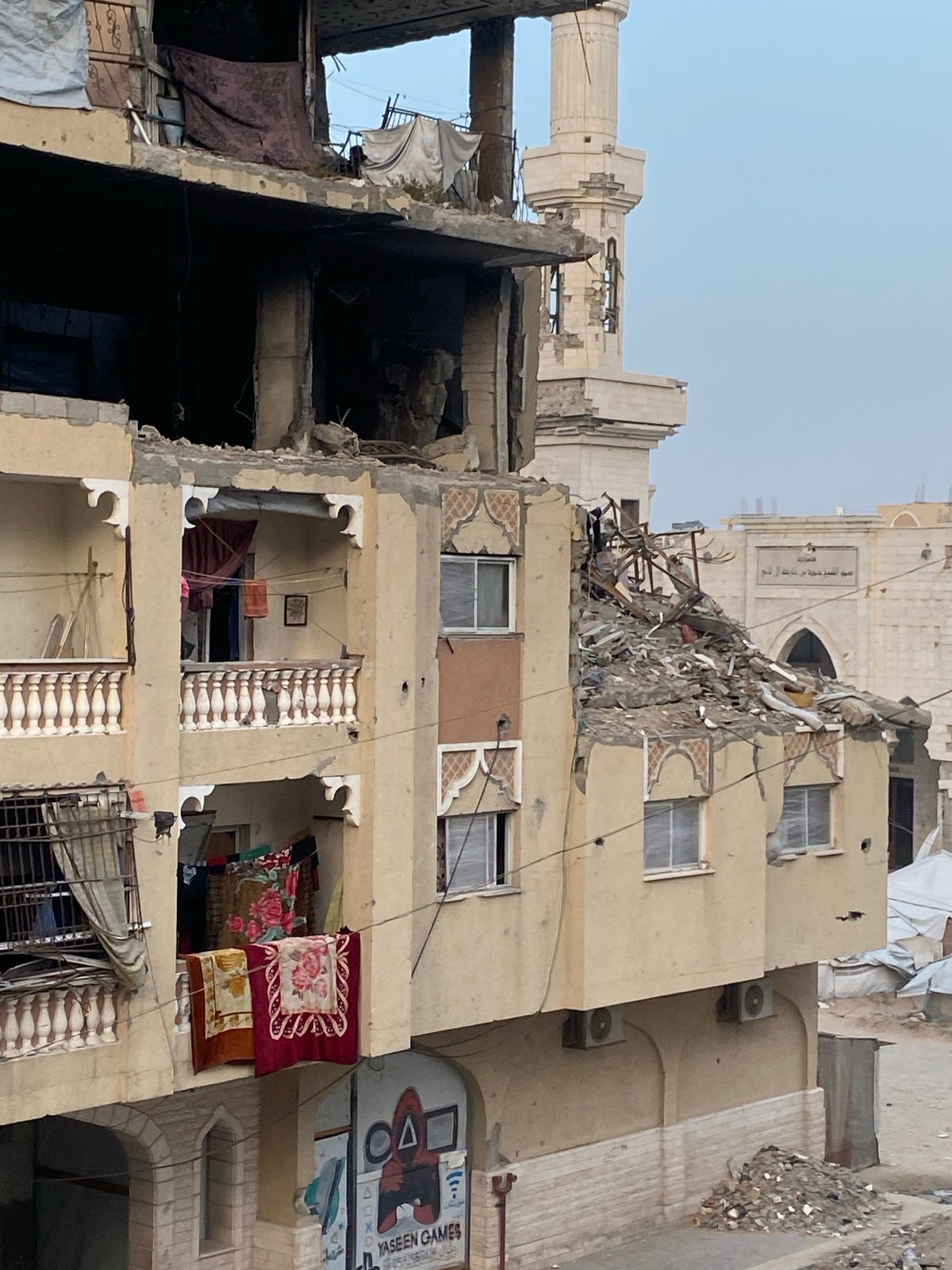 Salvage operations documented in Khan Yunis debris site