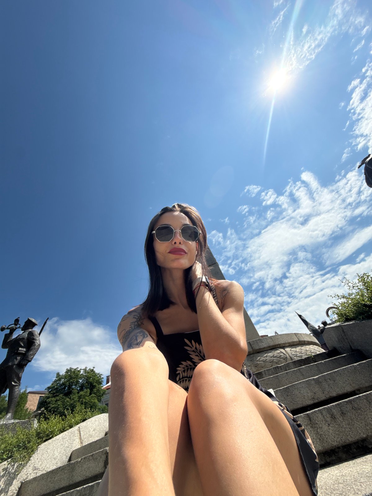 Woman takes selfies in sunny Pleven morning