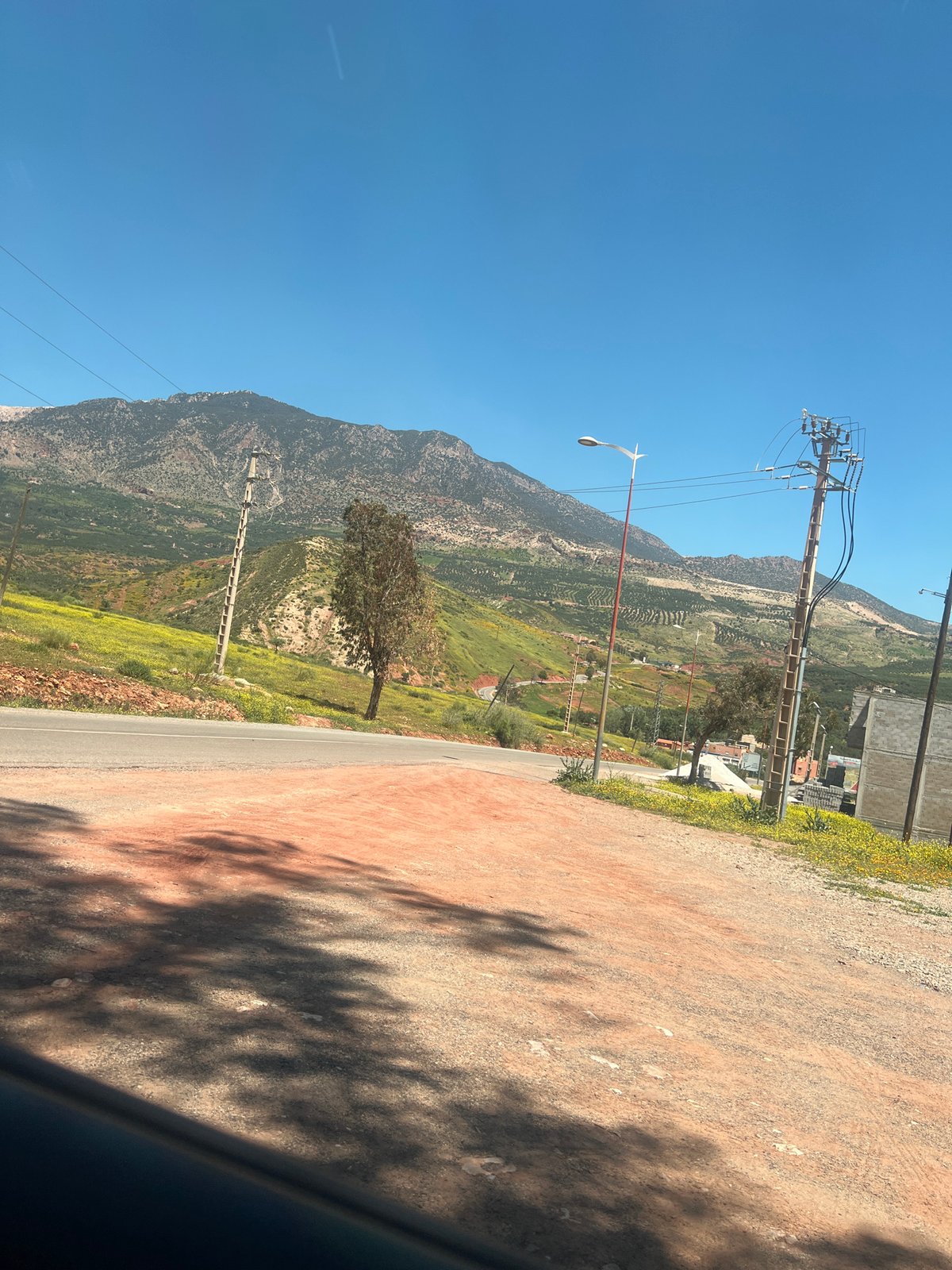 Morning drive documented through rural Ouaouizert, Morocco