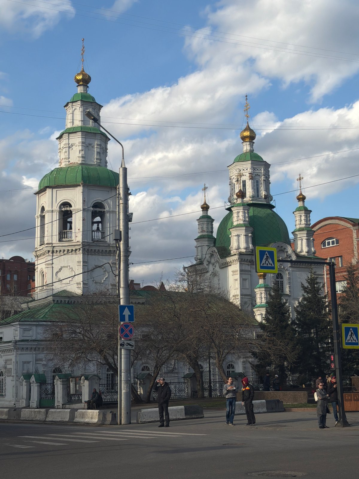 Morning street documentation around Krasnoyarsk cathedral captures urban life