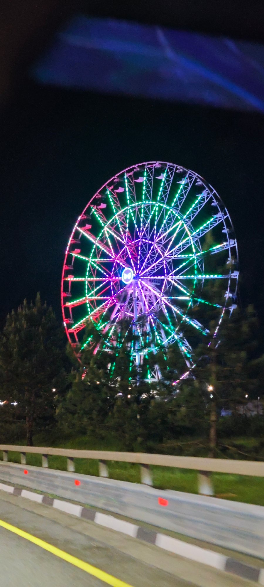 Illuminated Ferris wheel draws attention in Estosadok, Russia