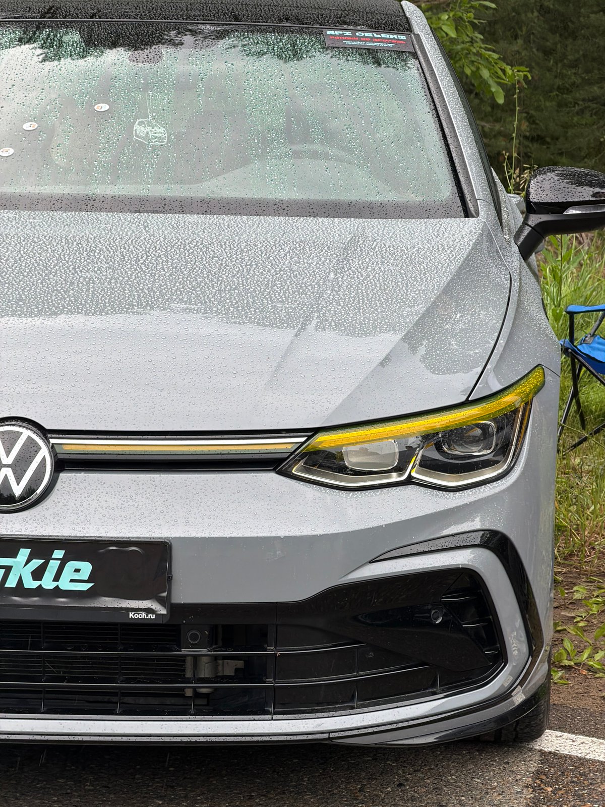 Rainy motorsport event in Chaikovsky features tuned VWs and race cars
