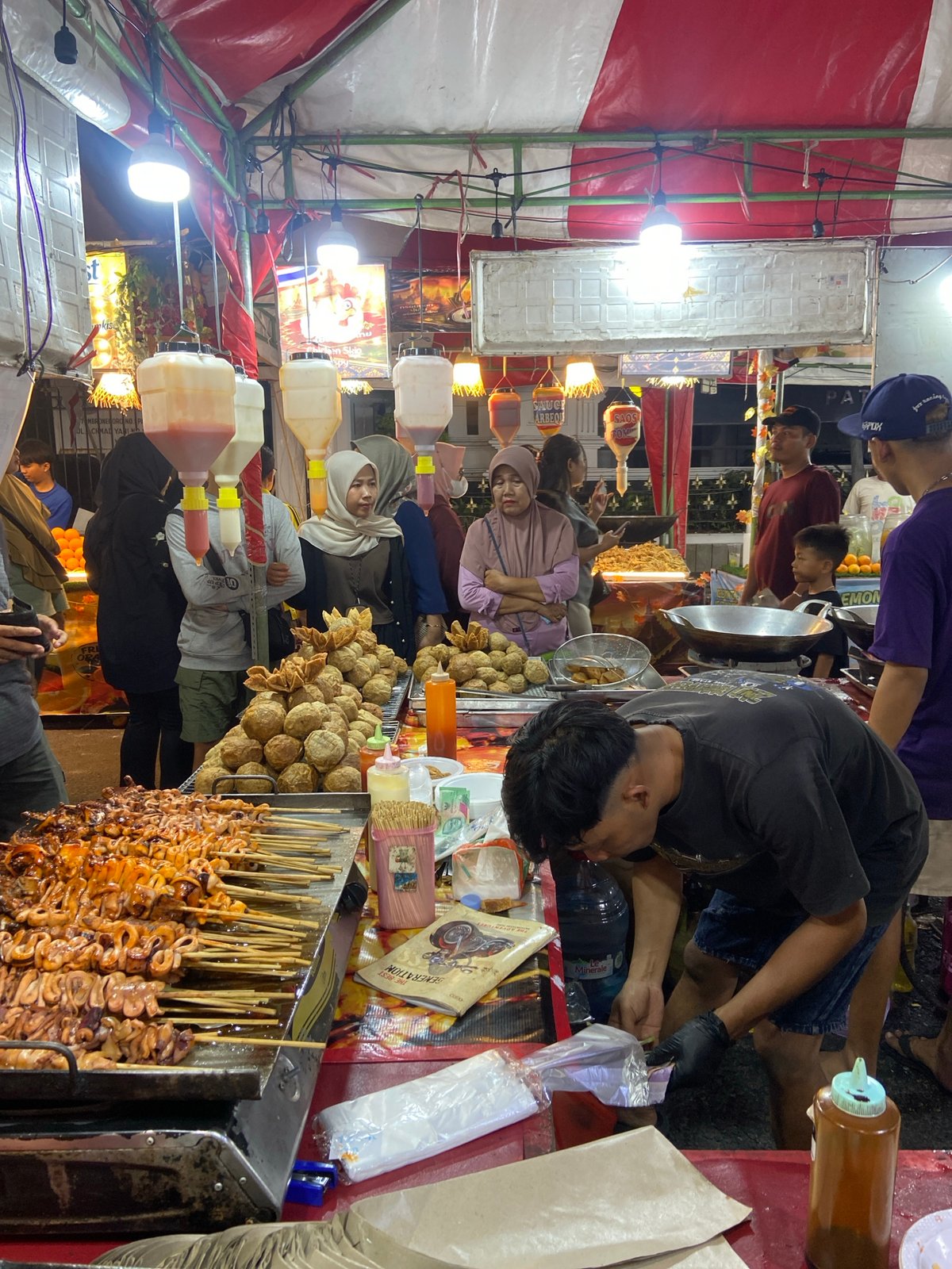 Night market in Kecamatan Pati: grilled squid, open flames, street stalls
