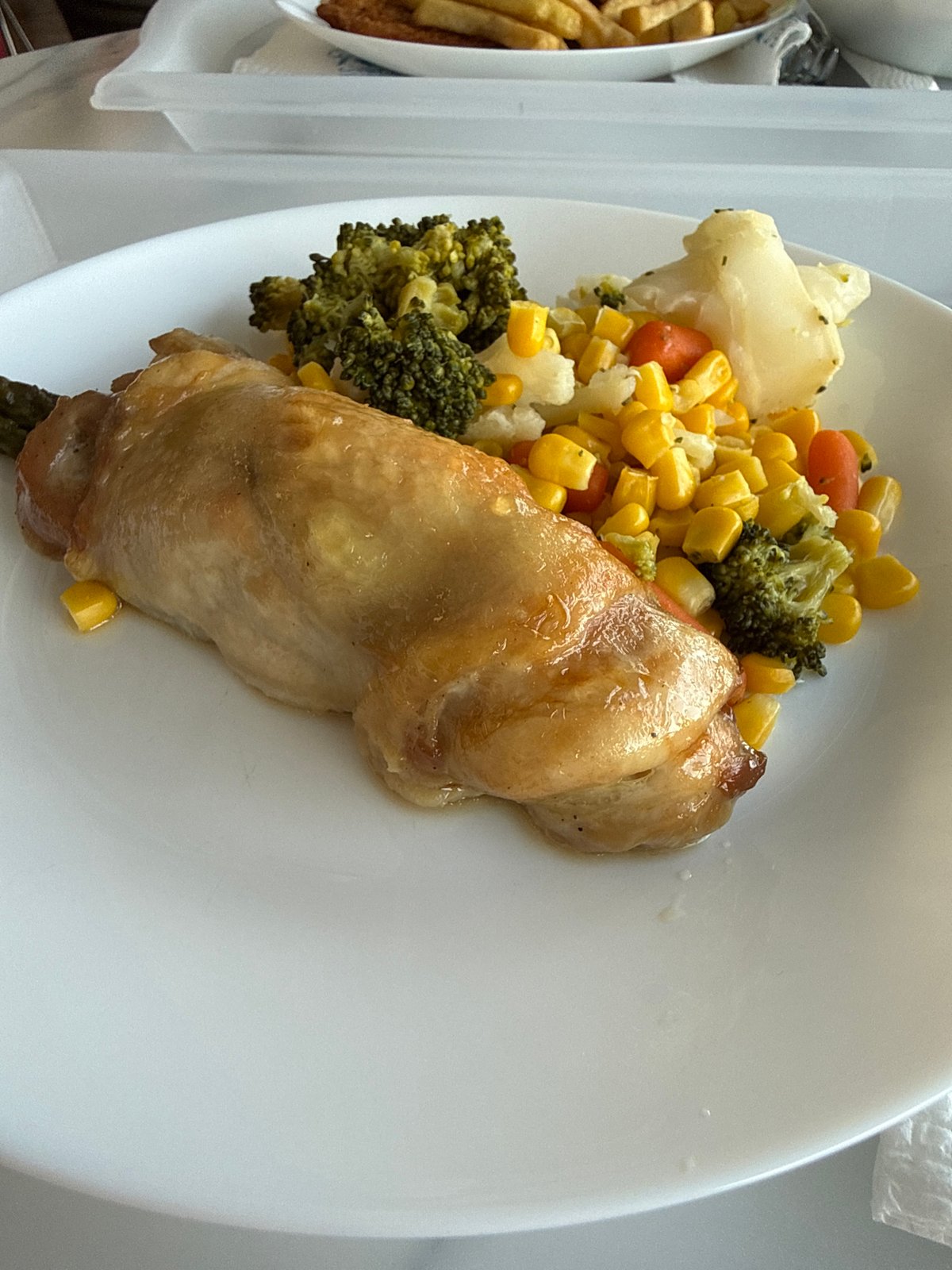 Healthy meal documented in Sofia featuring chicken and vegetables