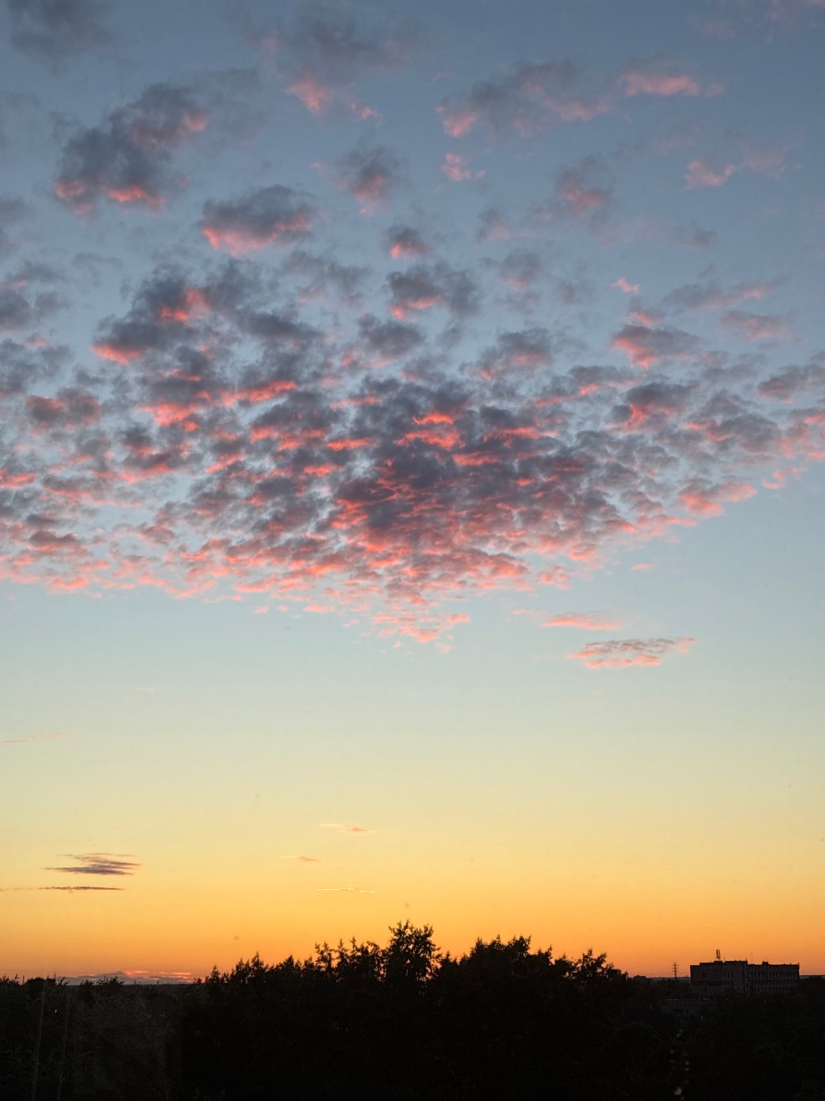 Sunset sky over a city, shot from multiple angles