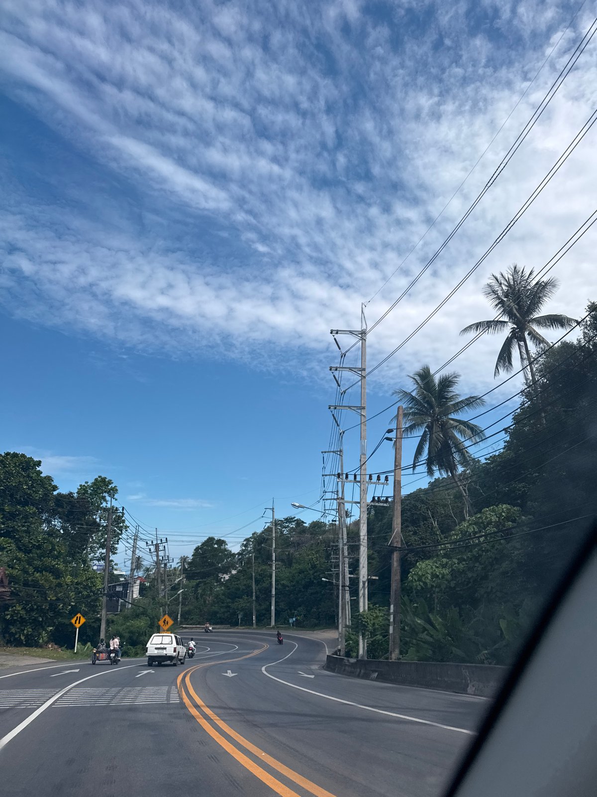 Early morning urban street scenes documented in tropical city