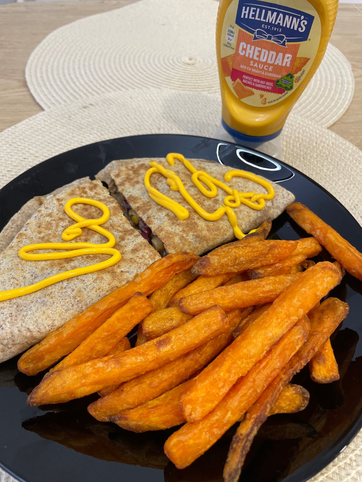 Quesadilla meal with cheddar sauce photographed in Burgas, Bulgaria