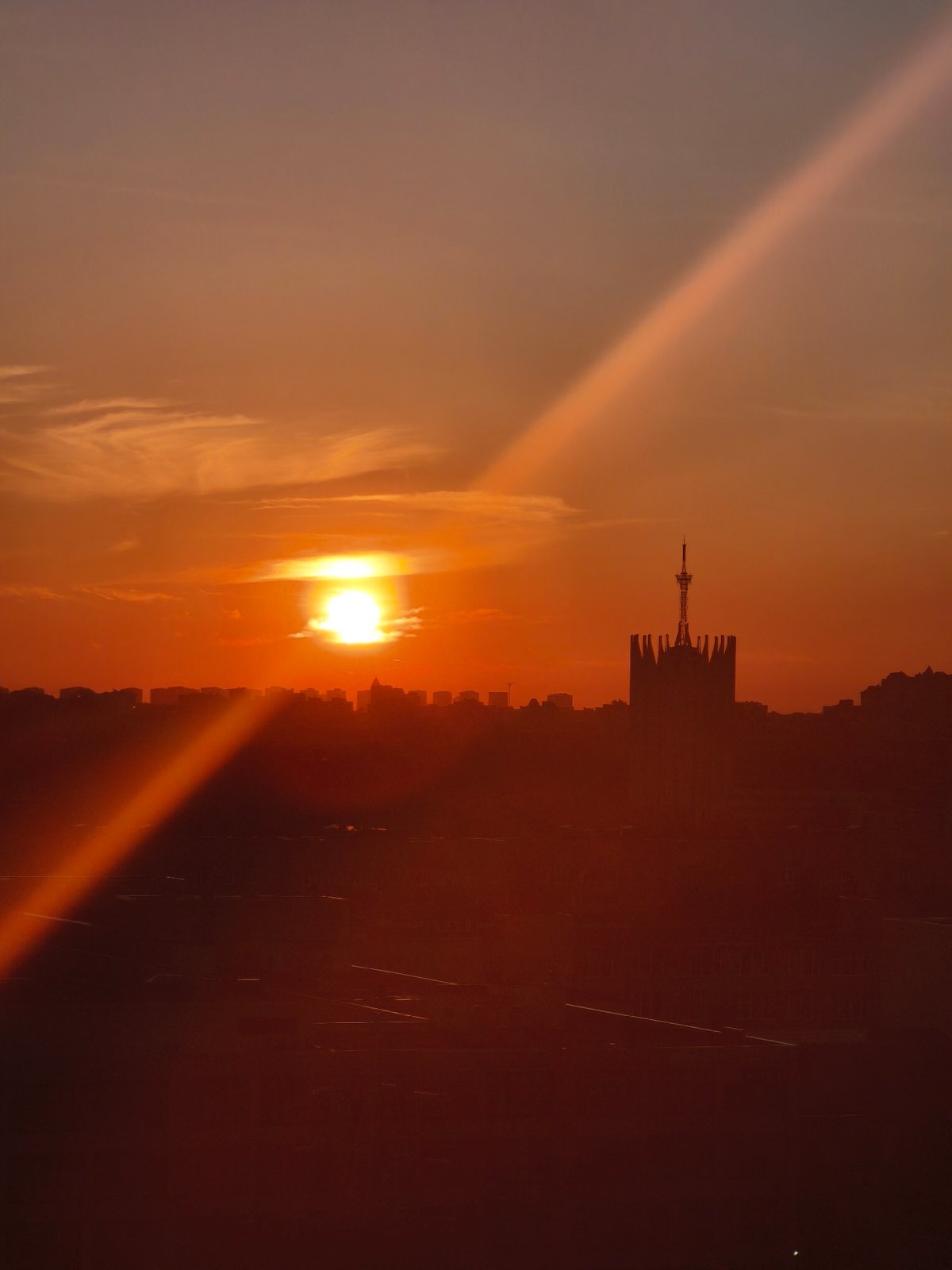Sunset observed over Saint Petersburg with distinctive light beam