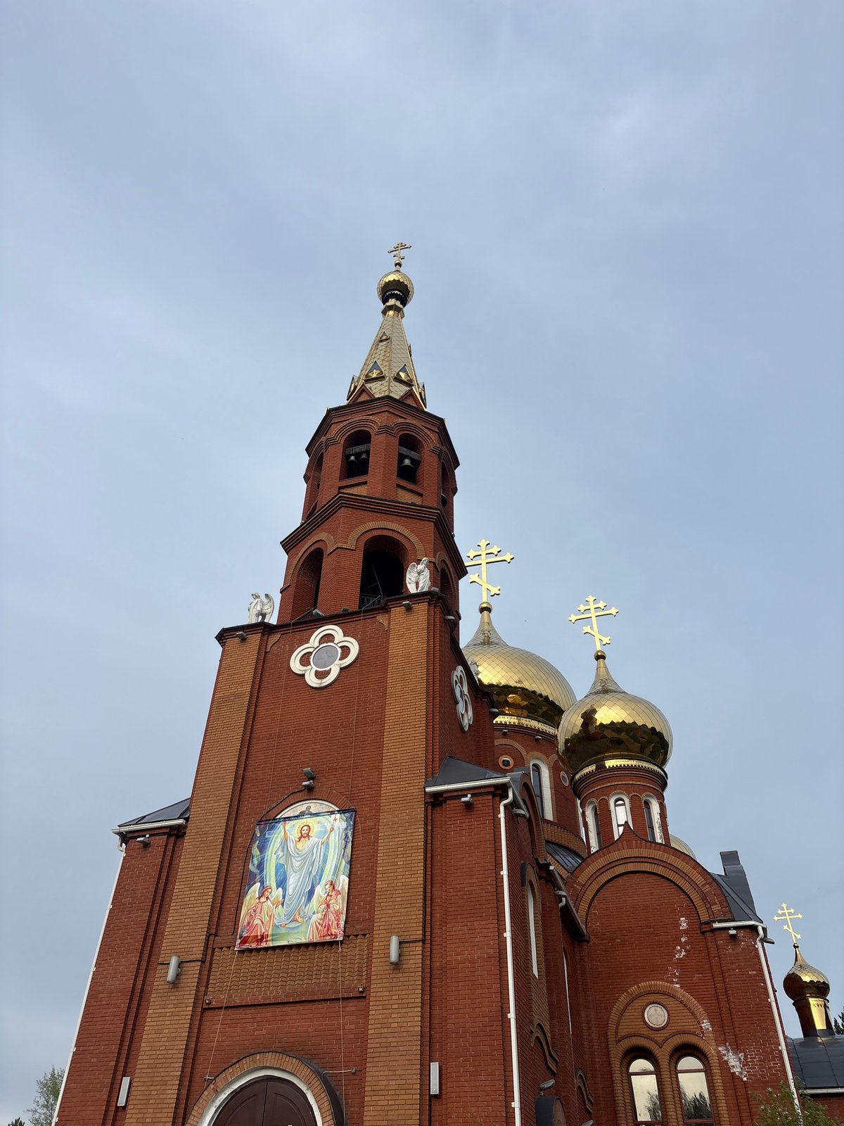Spring afternoon at church playground complex in Chaikovsky, Russia