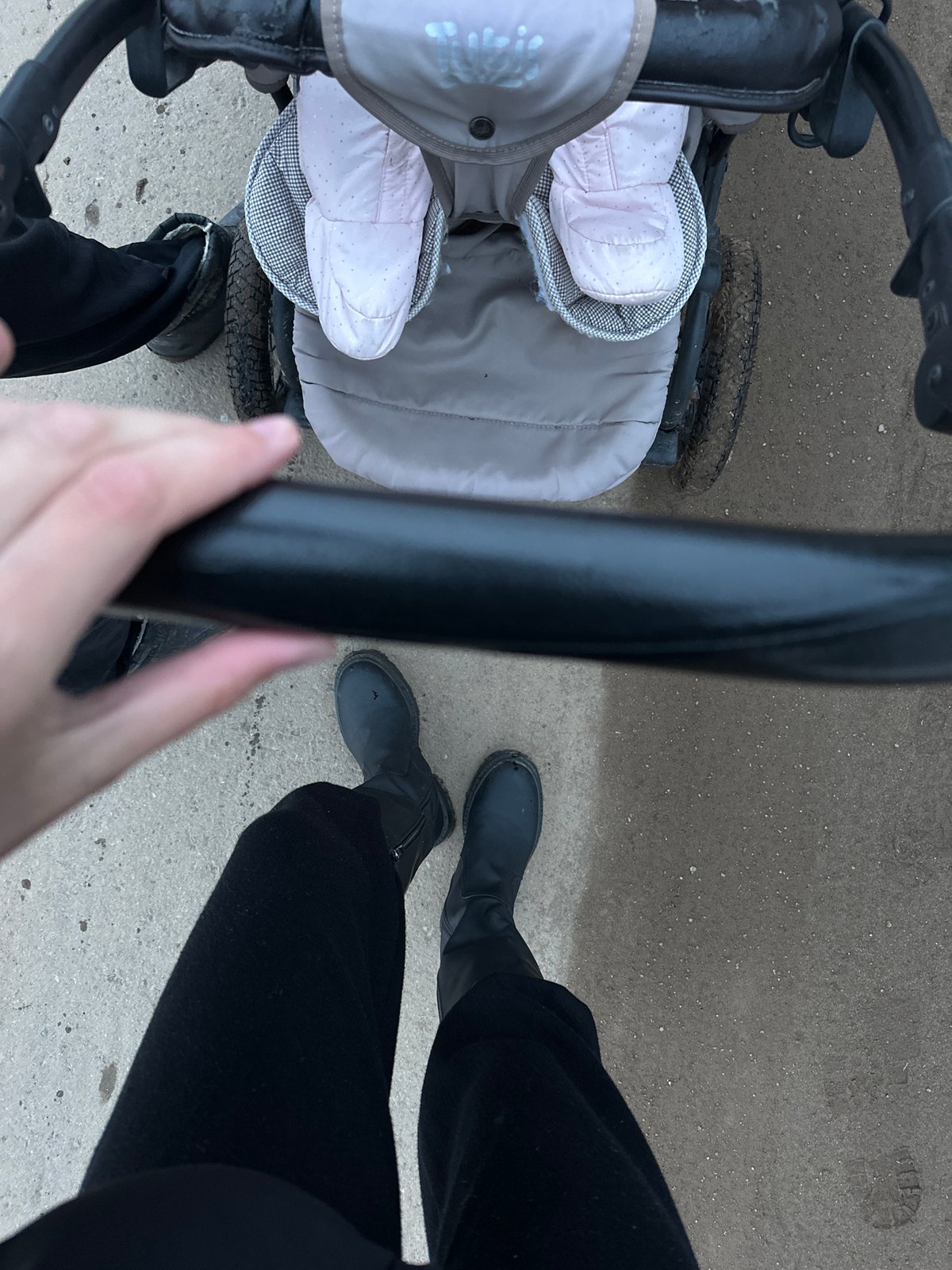 Parent pushes baby stroller in Подшивалово, Russia