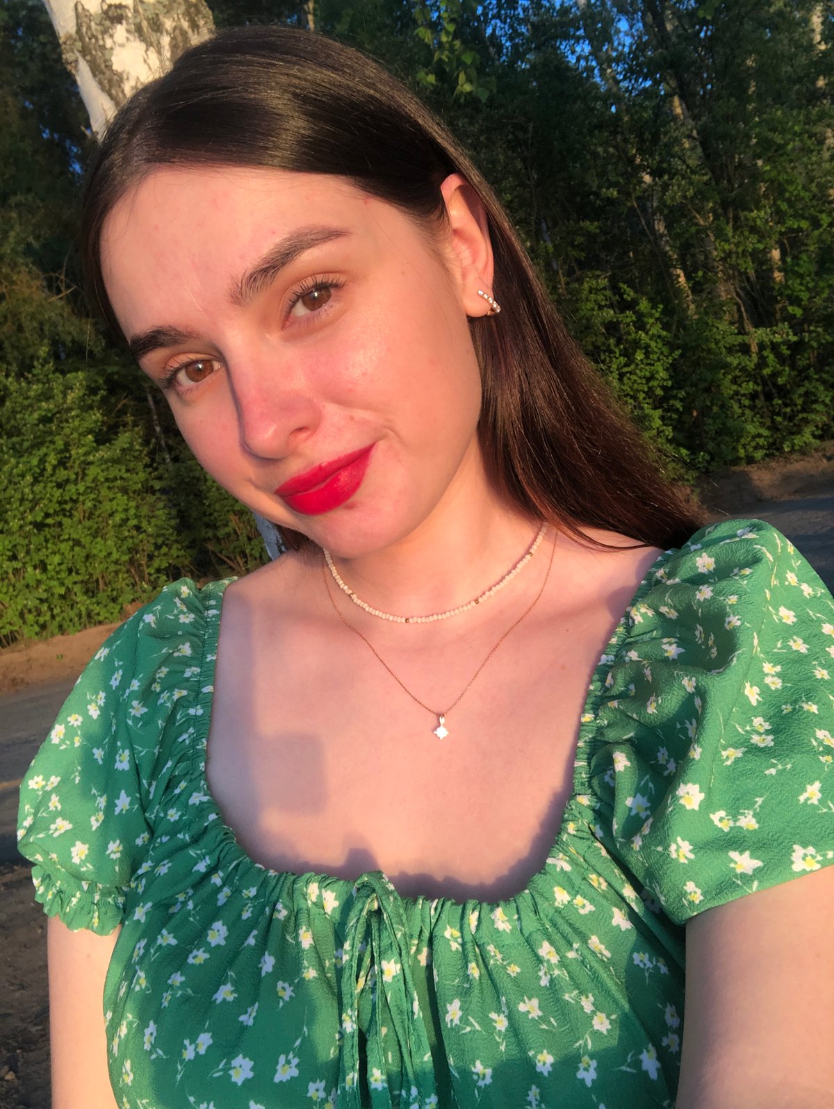 Sunset gathering documented on Kama River pier in Chaikovsky