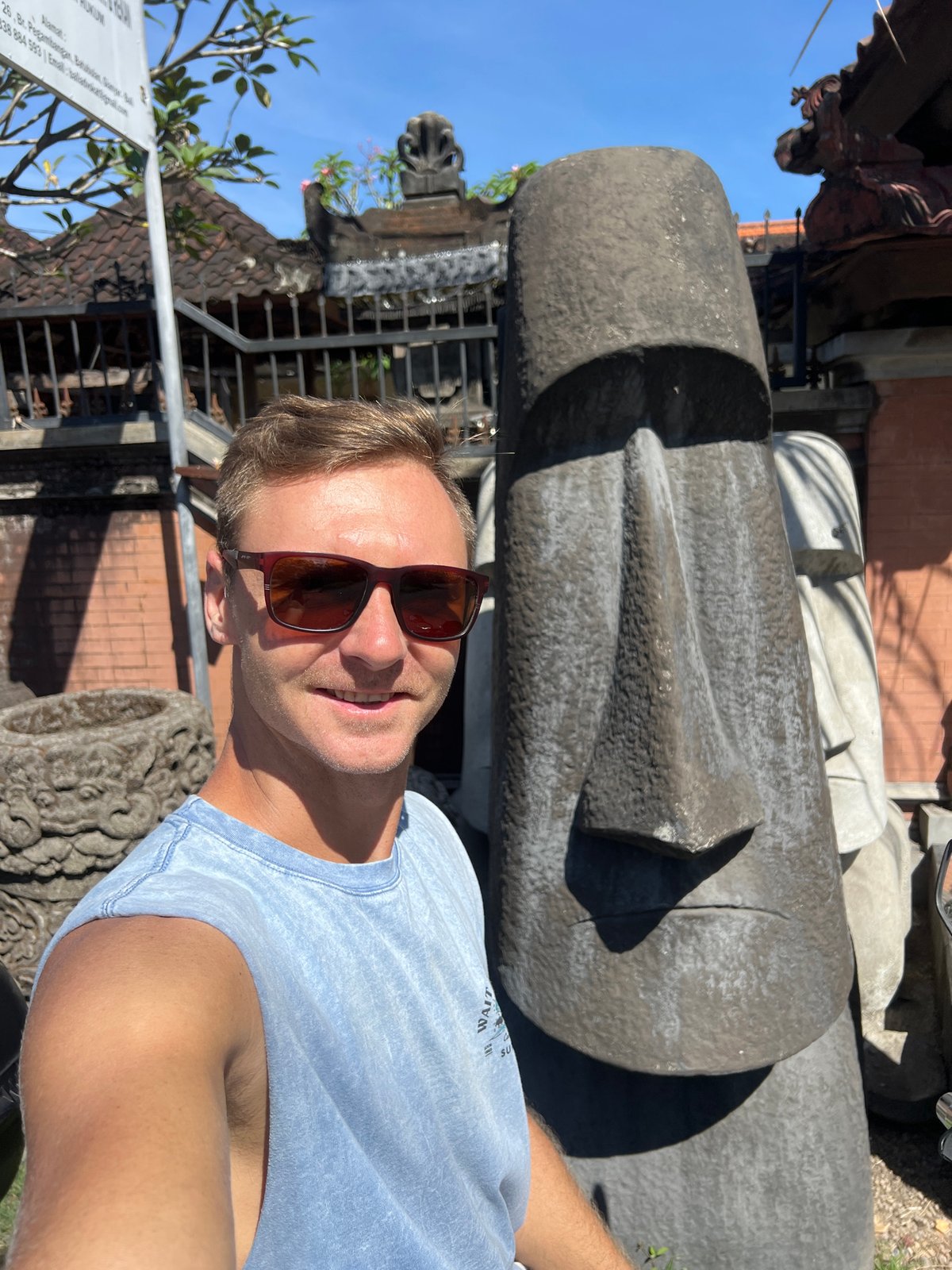 Stone statues, street murals, and rice paddies in Sukawati, Bali