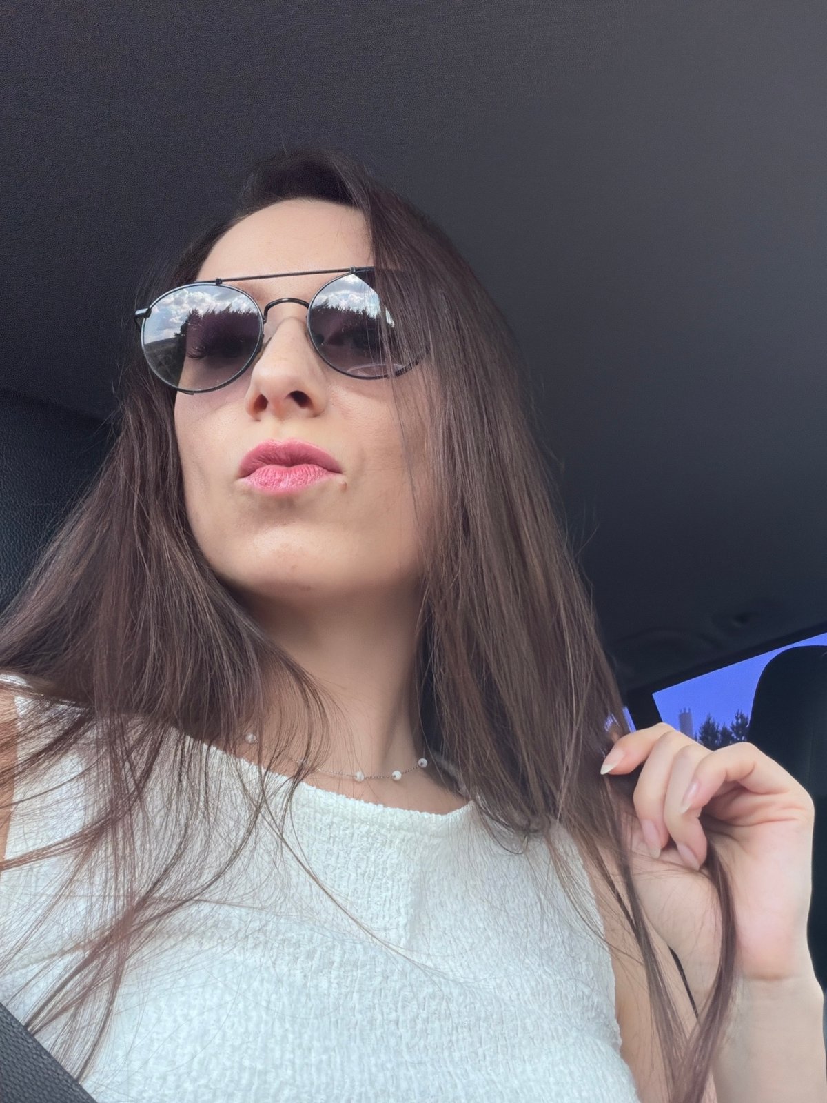 Inside a car in Oktyabrsky on a sunny afternoon