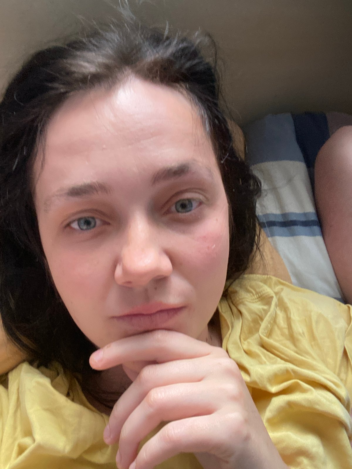 Casual bed selfies in a yellow t-shirt, multiple angles