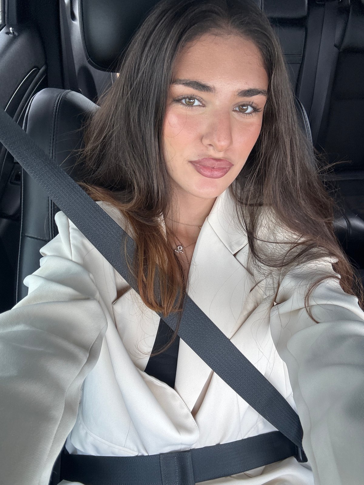 Woman in blazer observed in car, North Miami Beach