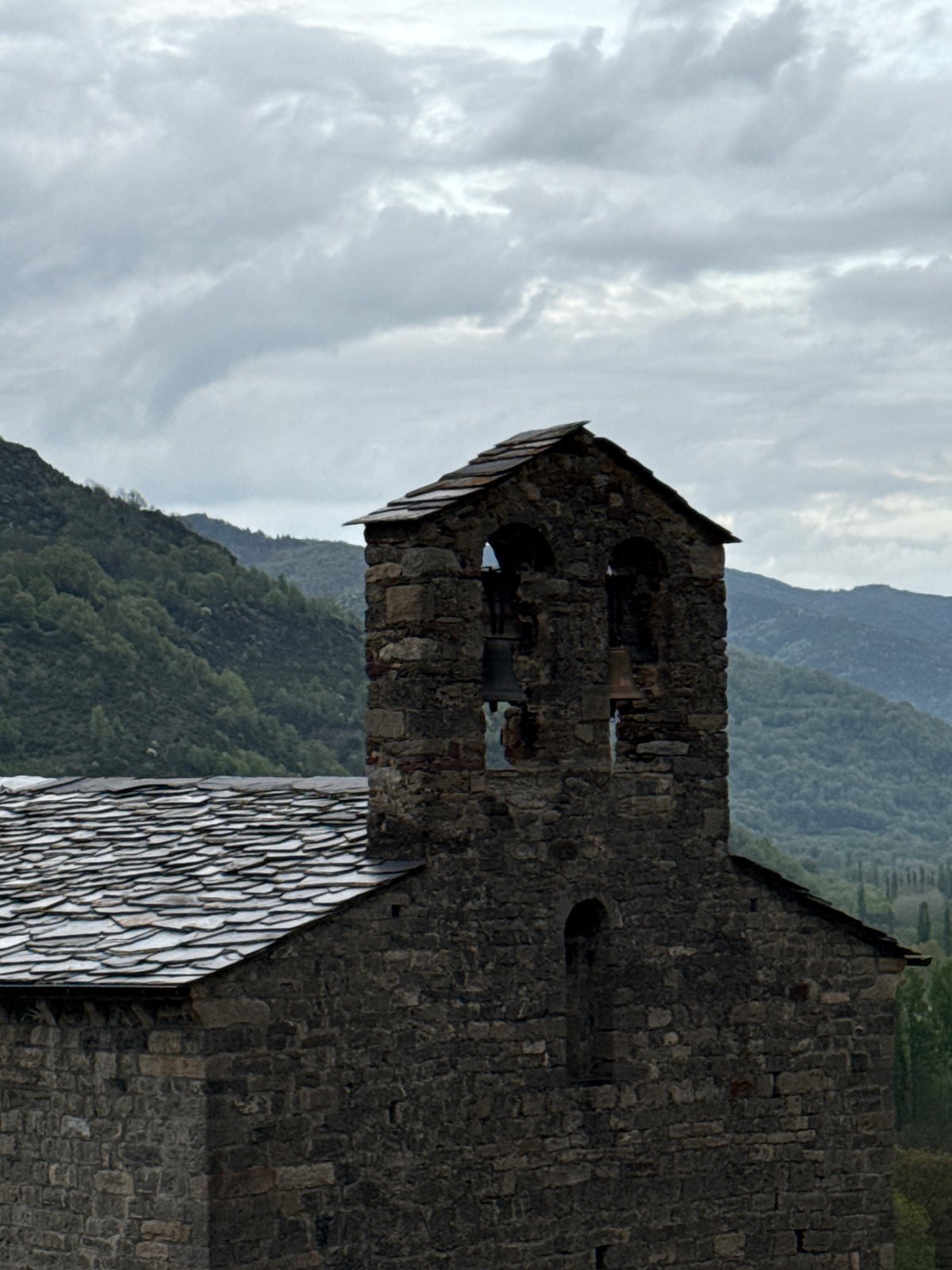 Romanesque church photographed in Villanova, Spain under cloudy skies