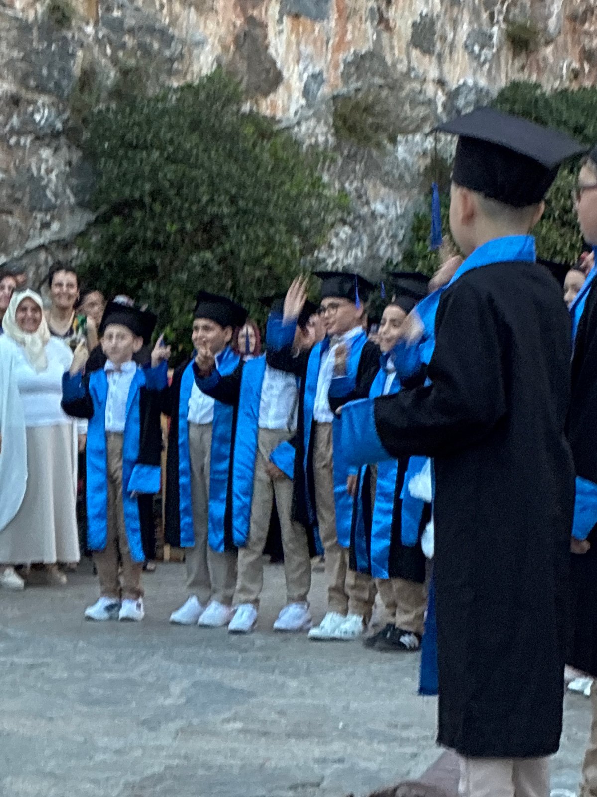 Graduation ceremony held at historic Alanya Castle at dusk