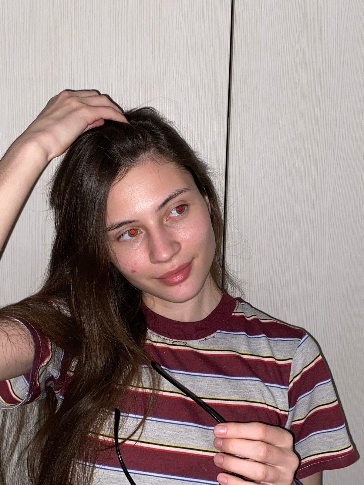 Young woman documents personal selfie session in Votkinsk, Russia